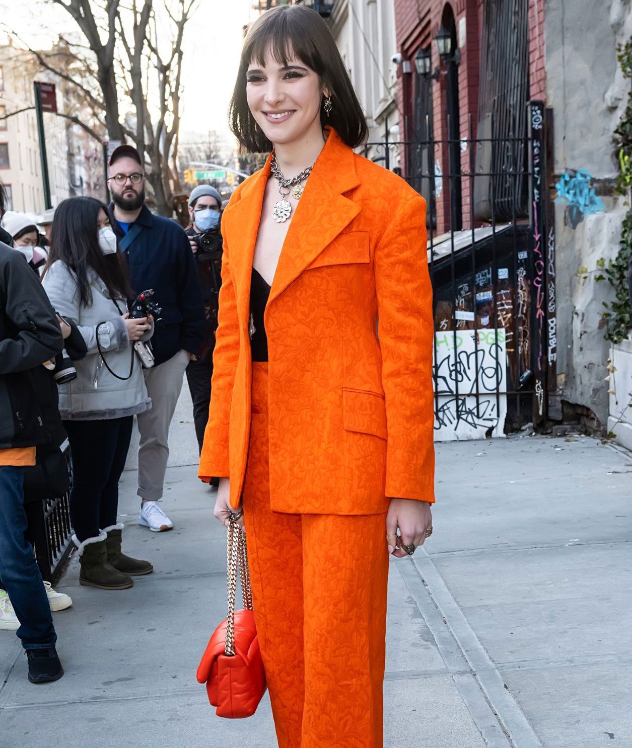 How celebrities are wearing the orange colour trend in 2022 - InStyle