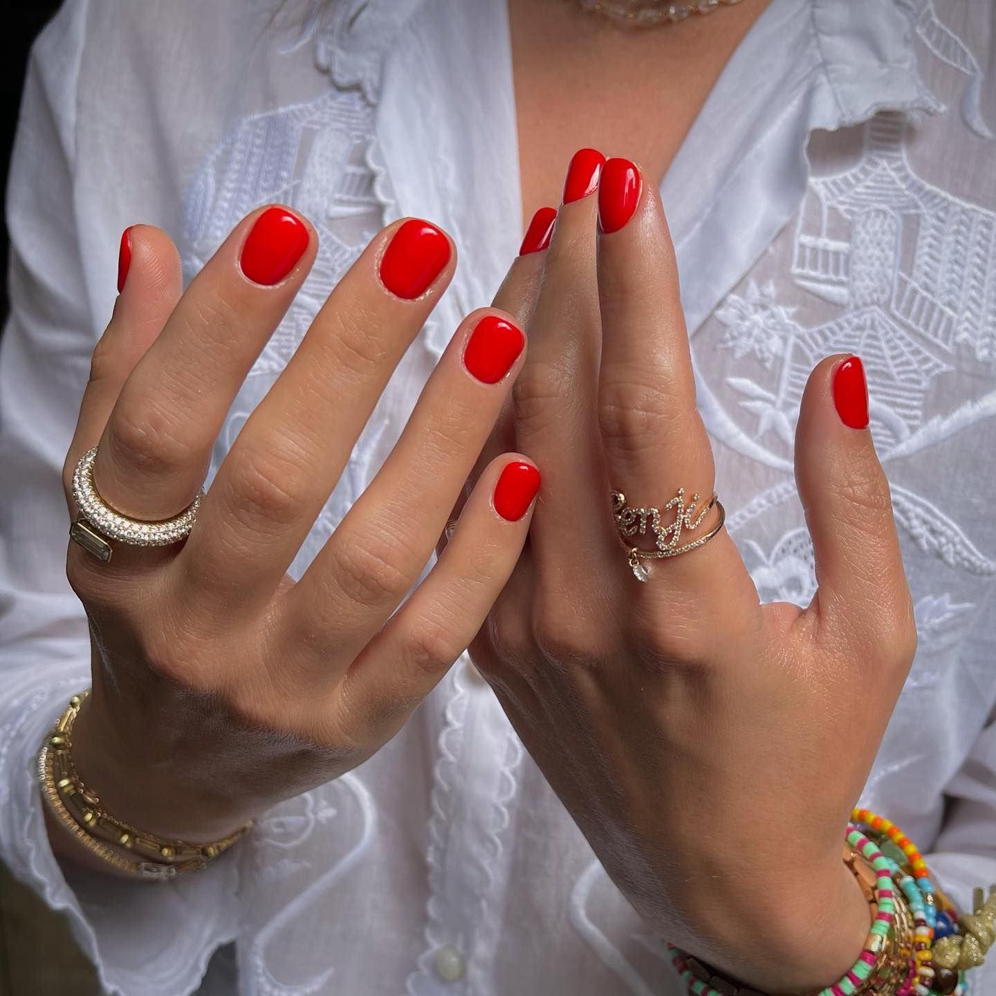 Petals and polish: red nails with floral design : r/NailArt