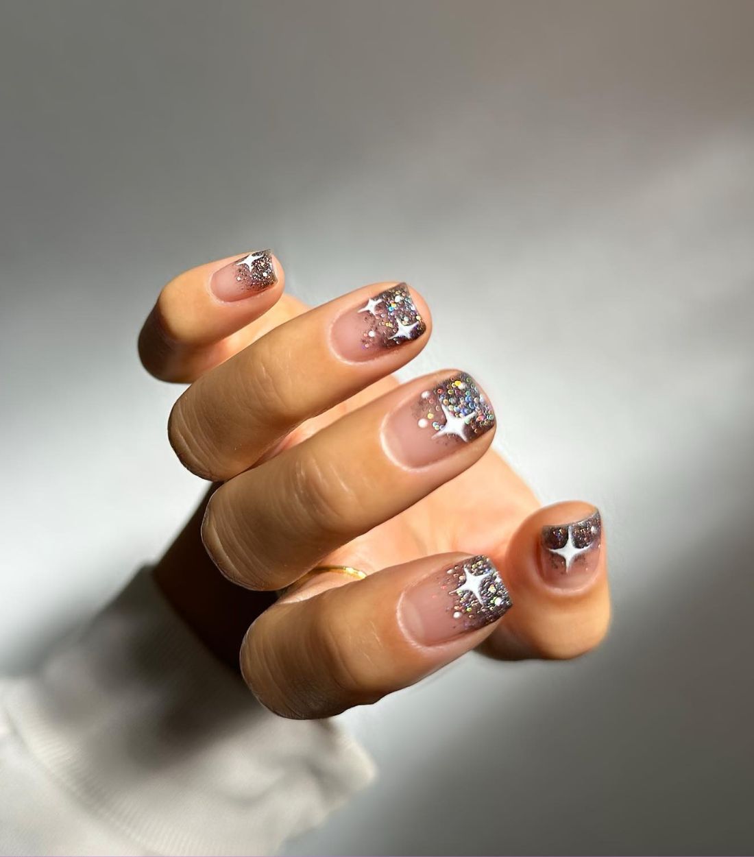 Glittery silver French manicure