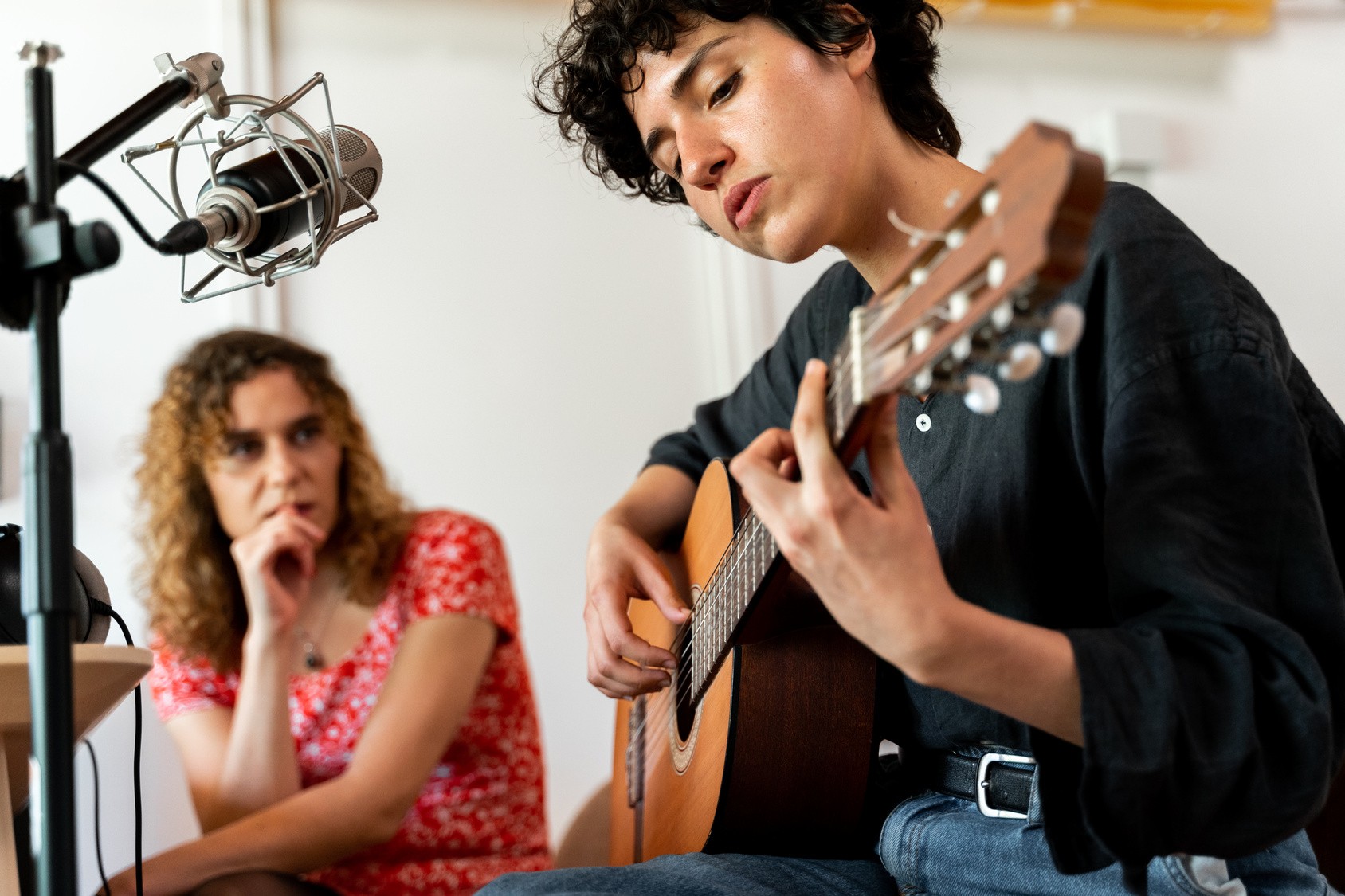 Two persons playing music