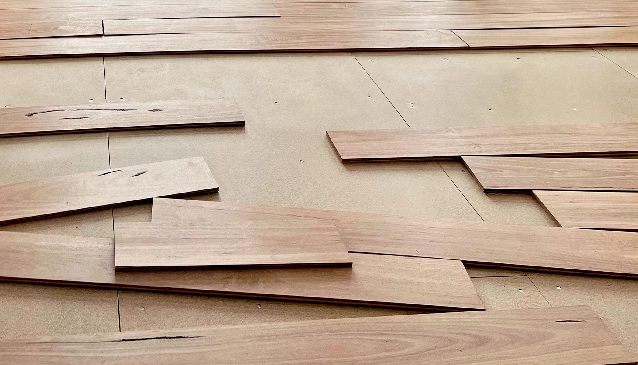 A close up showing installation of STRUCTApanel® underneath timber flooring