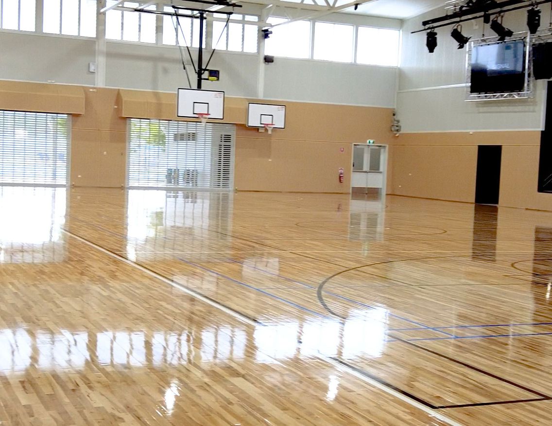 Closeup of STRUCTApanel® 12mm underneath a basketball stadium floor