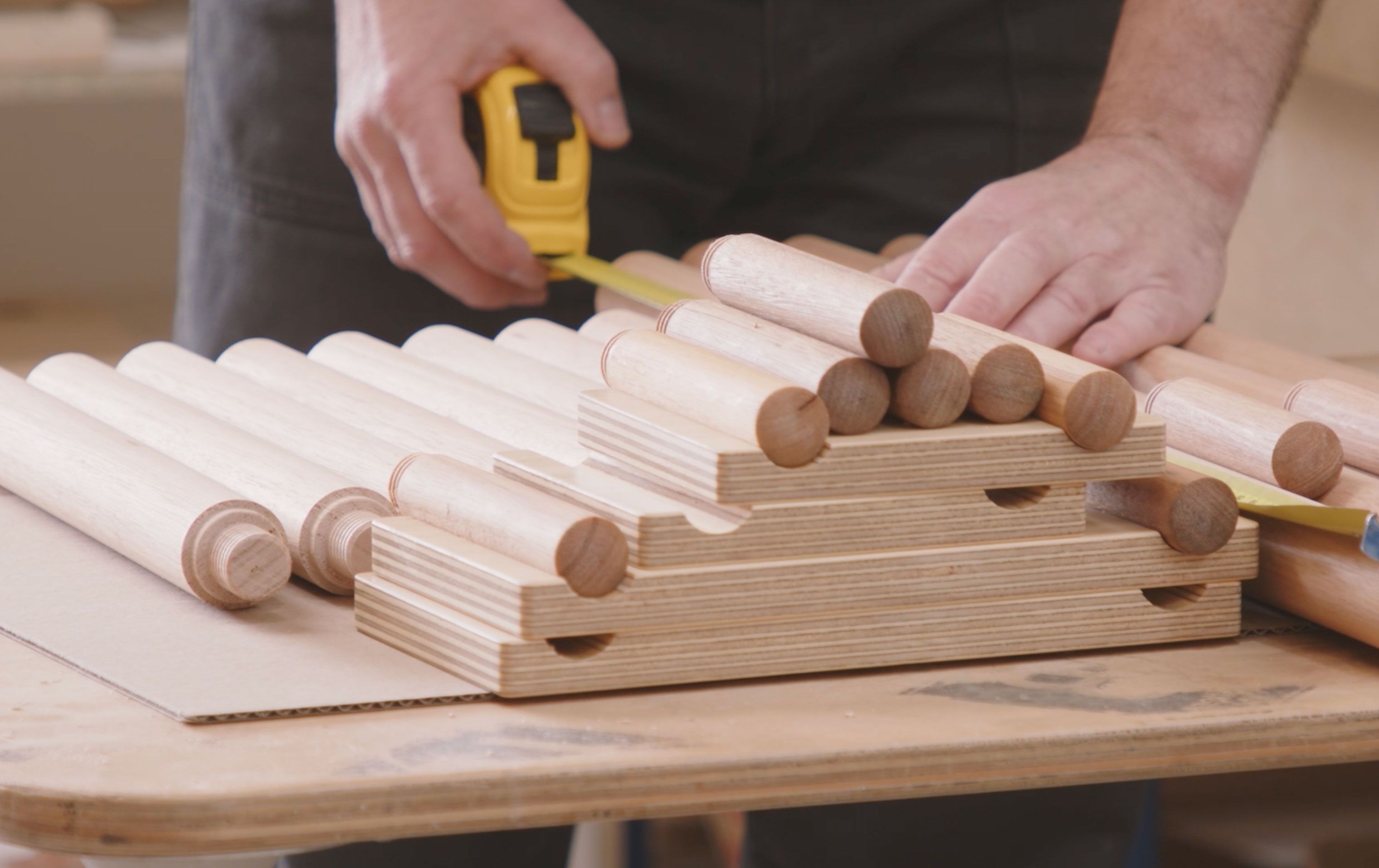Cameron from Like Butter measuring Porta Tasmanian Oak dowels ready to be used in their furniture