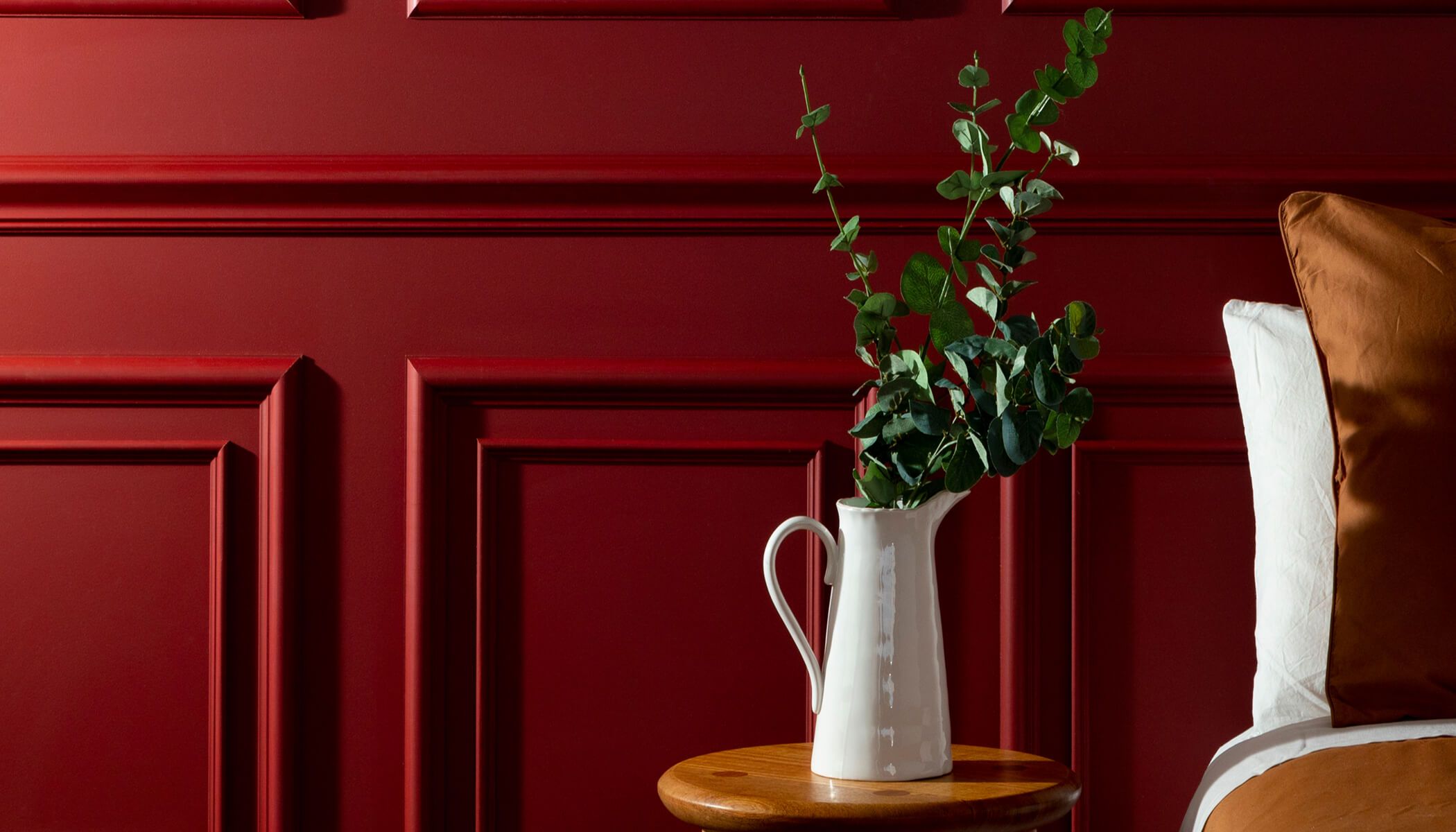 Wall solution featuring red wall panels.