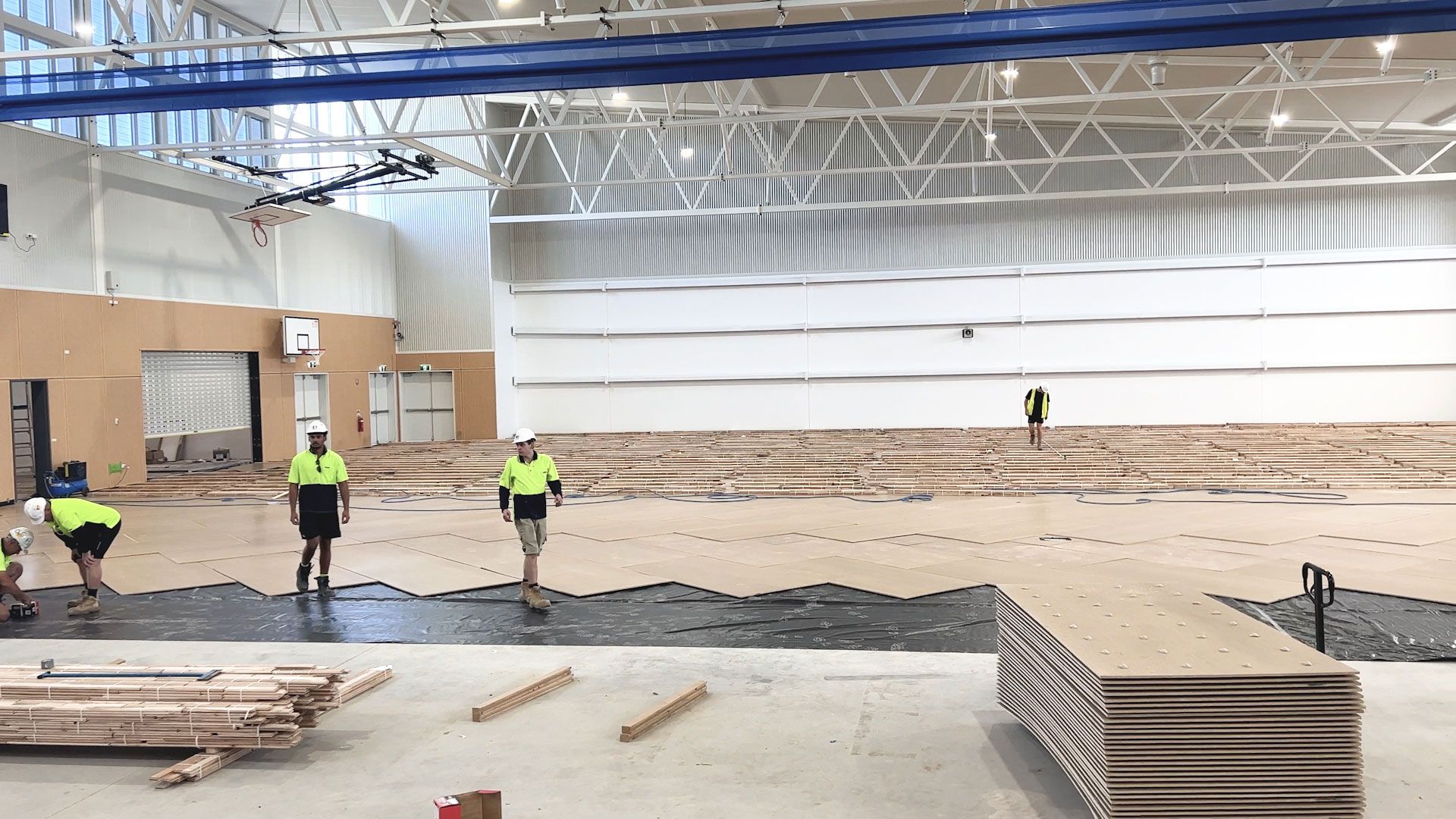 Basketball timber flooring being installed over STRUCTApanel® Smooth 12mm