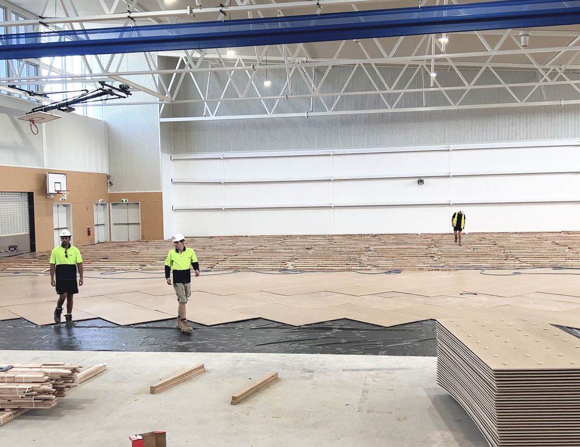 Basketball timber flooring being installed over STRUCTApanel® Smooth 12mm
