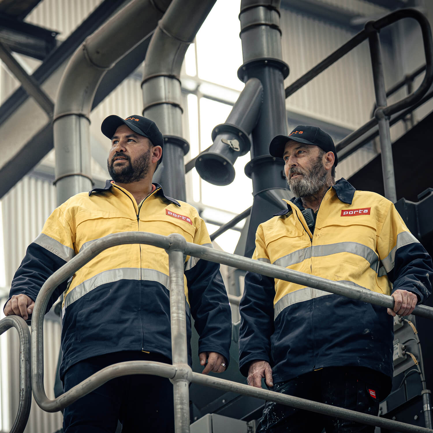 Porta Staff, wearing high res jacket, at our Oberon facility, looking off in the distance