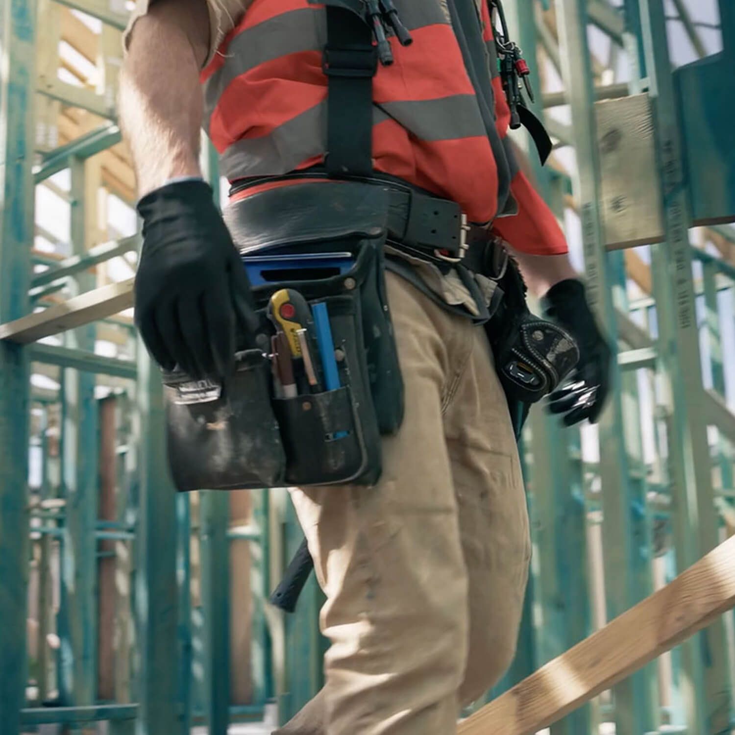 A person at a construction site using a STRUCTAframe™ system.