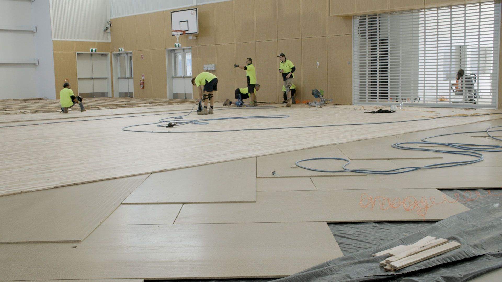Basketball timber flooring being installed over STRUCTApanel® Smooth 12mm