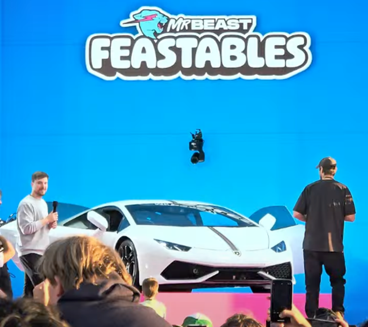 MrBeast on stage with Lamborghini