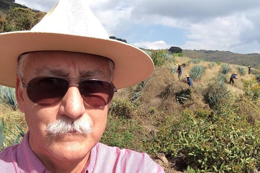 Miguel in front of agave farmer 2 _872by580.jpg