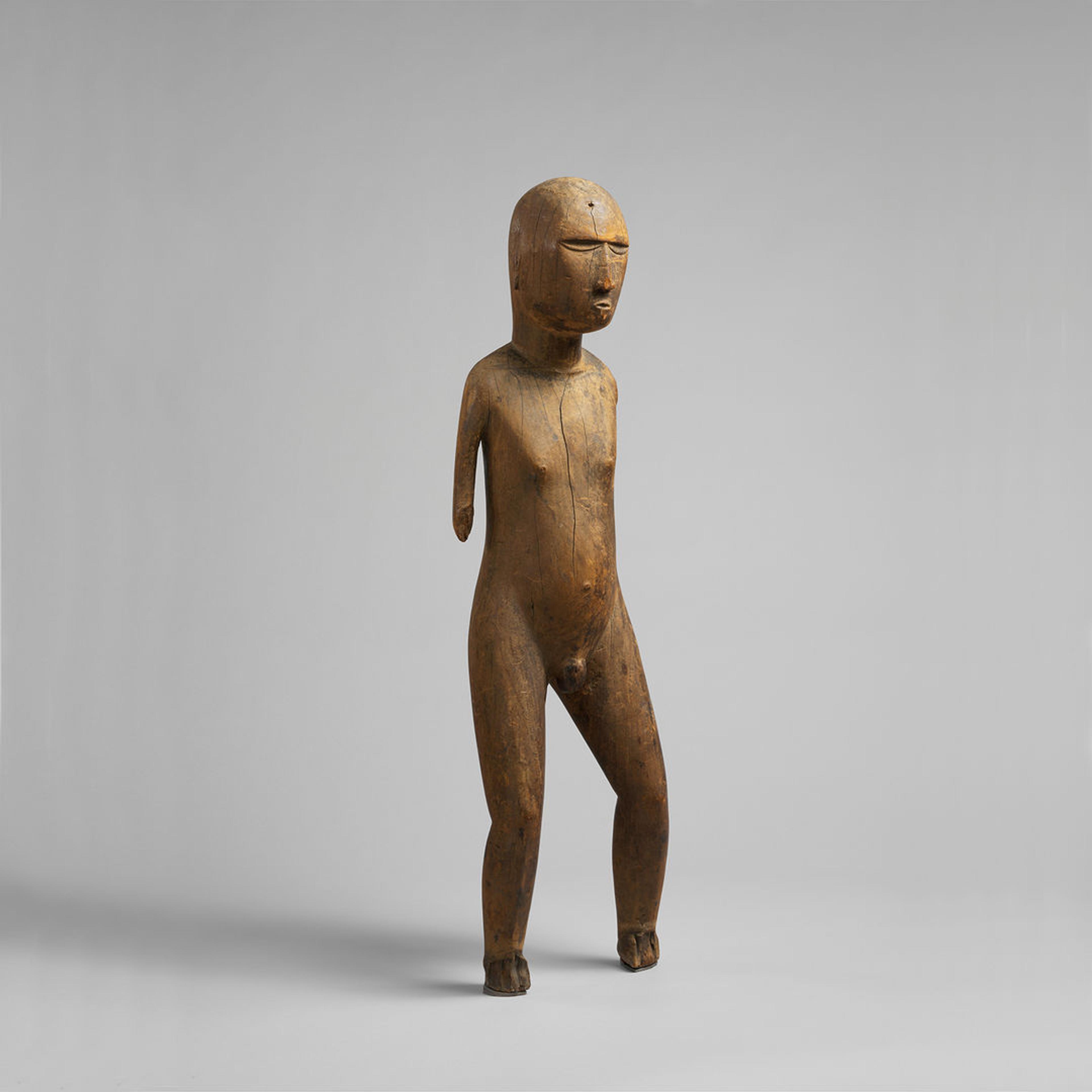 Wood sculpture of a male figure or tiki