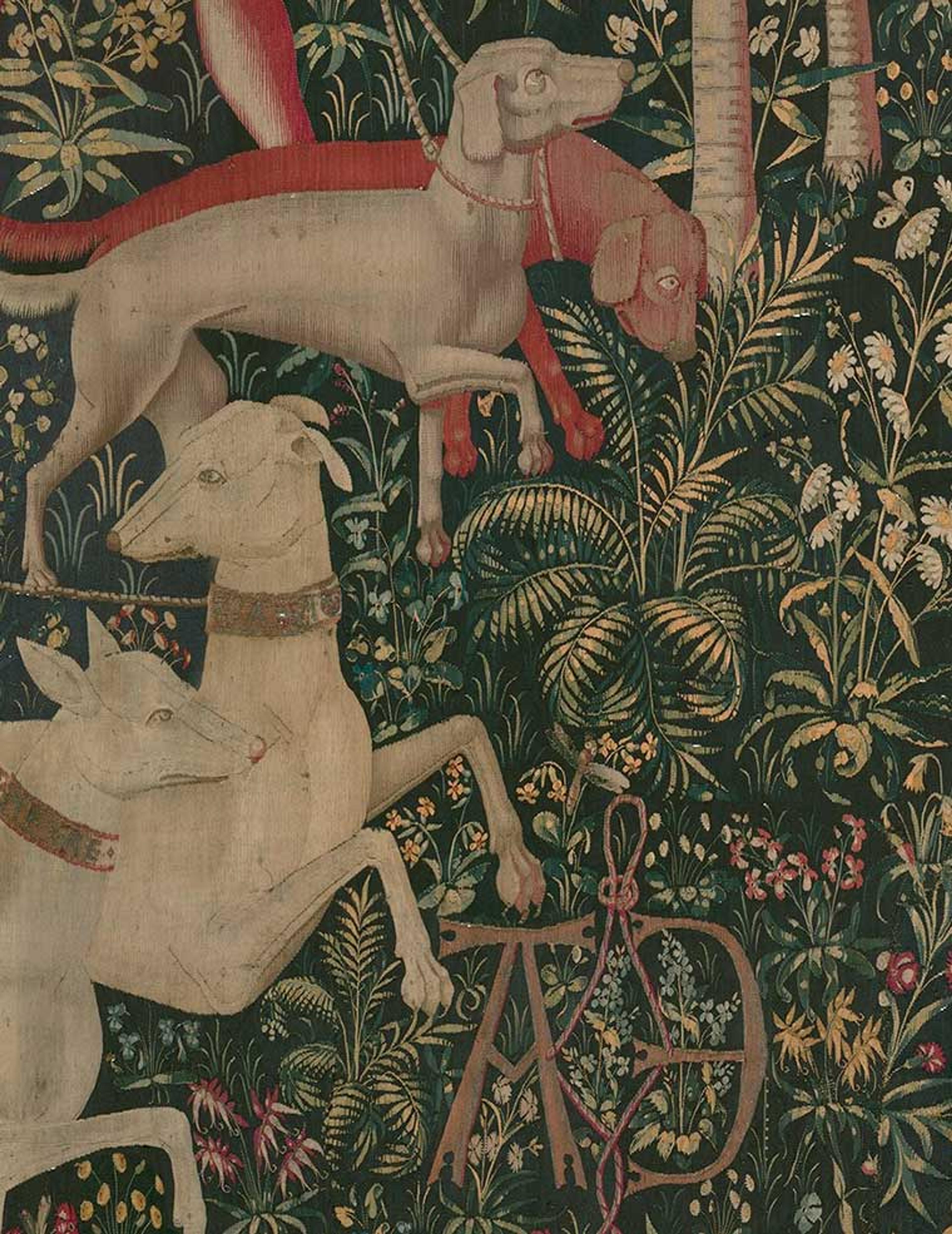 Detail of a date palm and dogs from "The Hunters Enter the Woods" from the Unicorn Tapestries