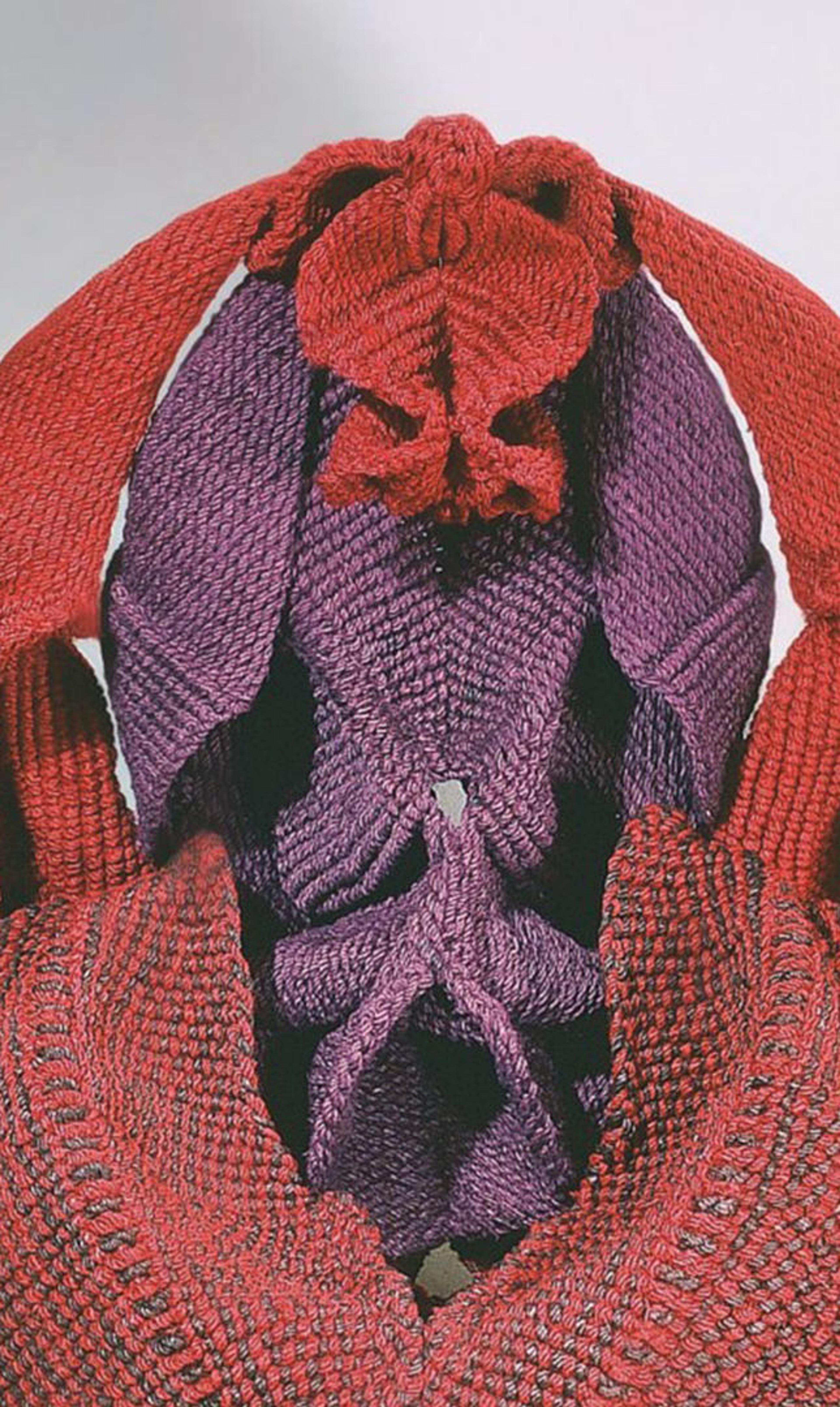 Detail of Mrinalini Mukherjee’s fibre red and purple sculpture depicting  unfurling forms that resemble female genitalia.