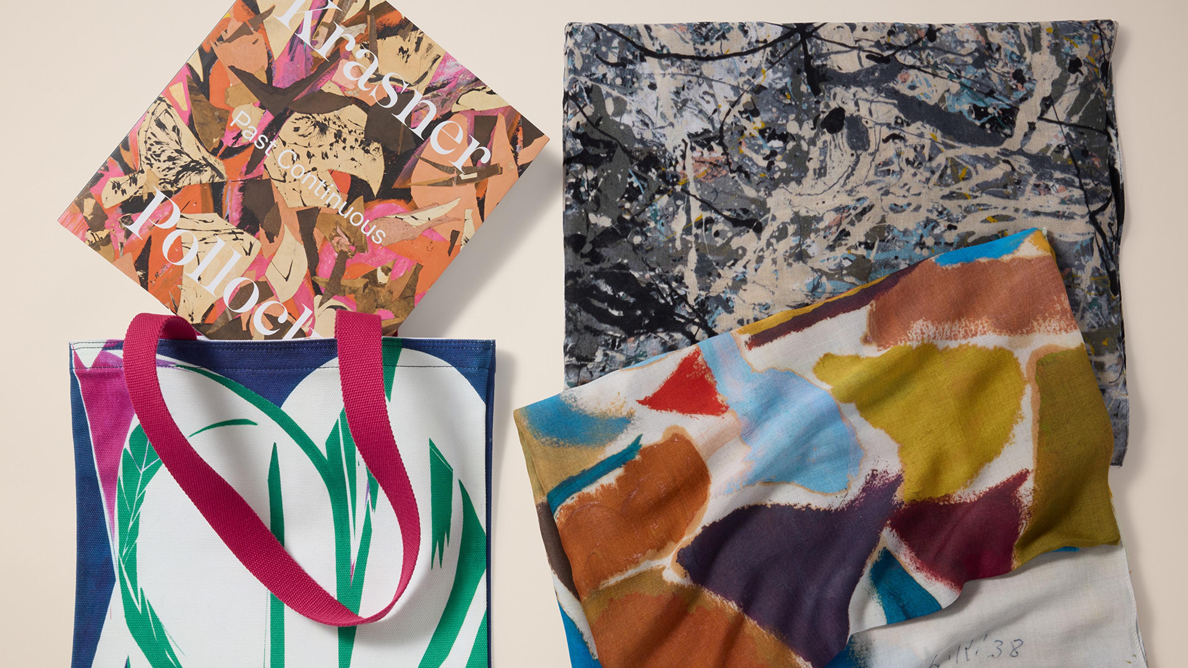 Image of the Krasner and Pollock catalogue, a tote bag, and scarves. 