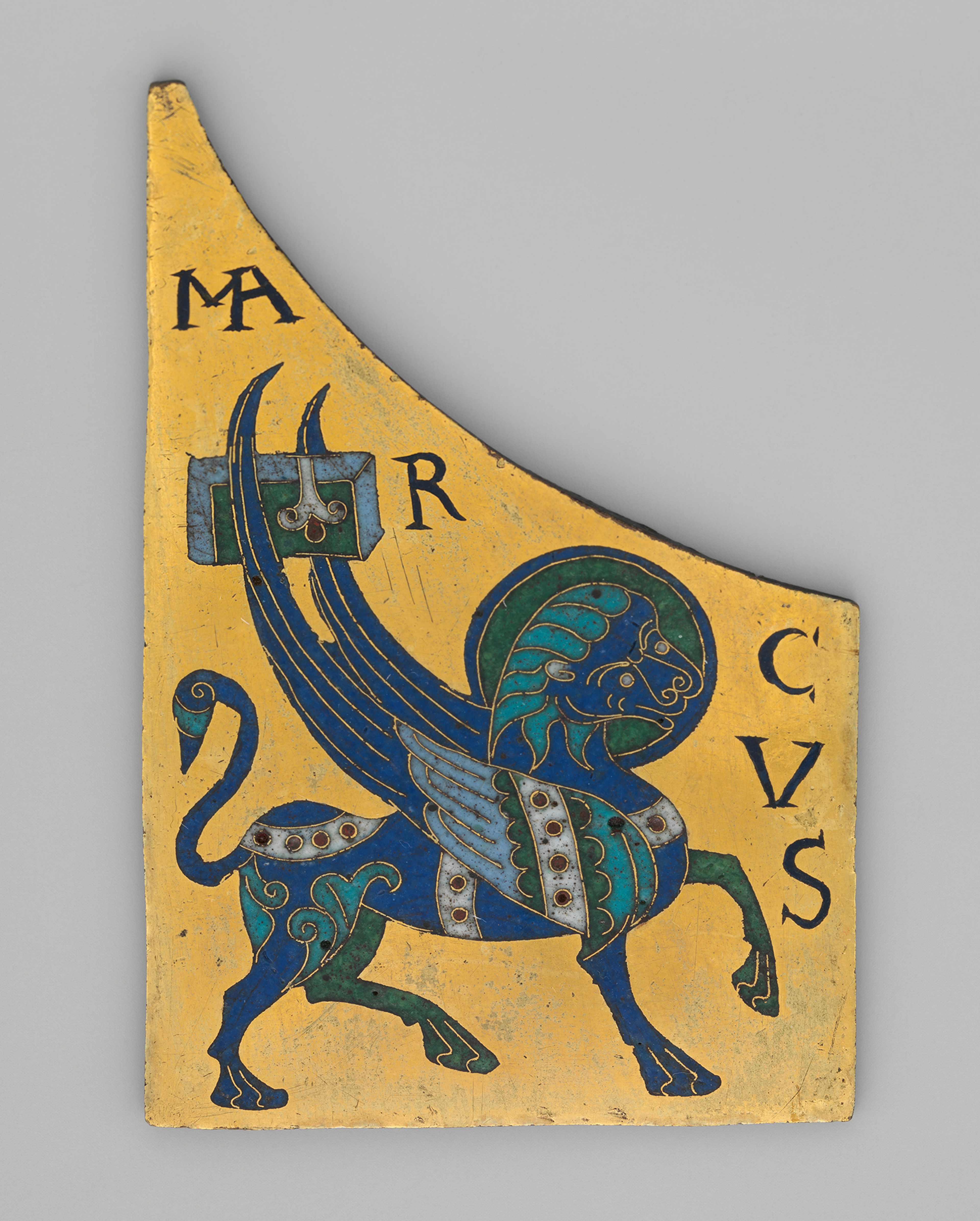 A worn yellow medieval panel depicts a blue-green winged lion with a curled tail, gold accents, and black lettering.