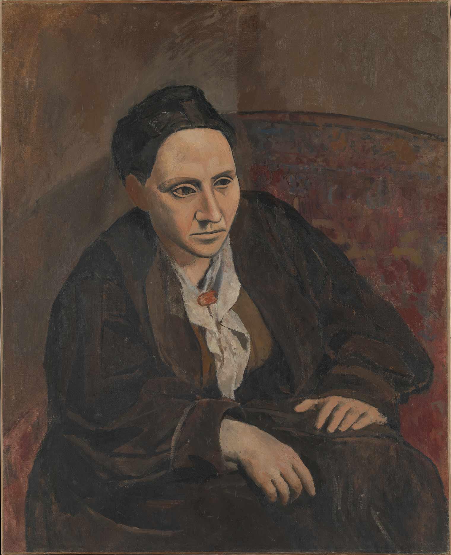 Portrait painting of a woman, Gertrude Stein, wearing brown and seated in a brown chair.