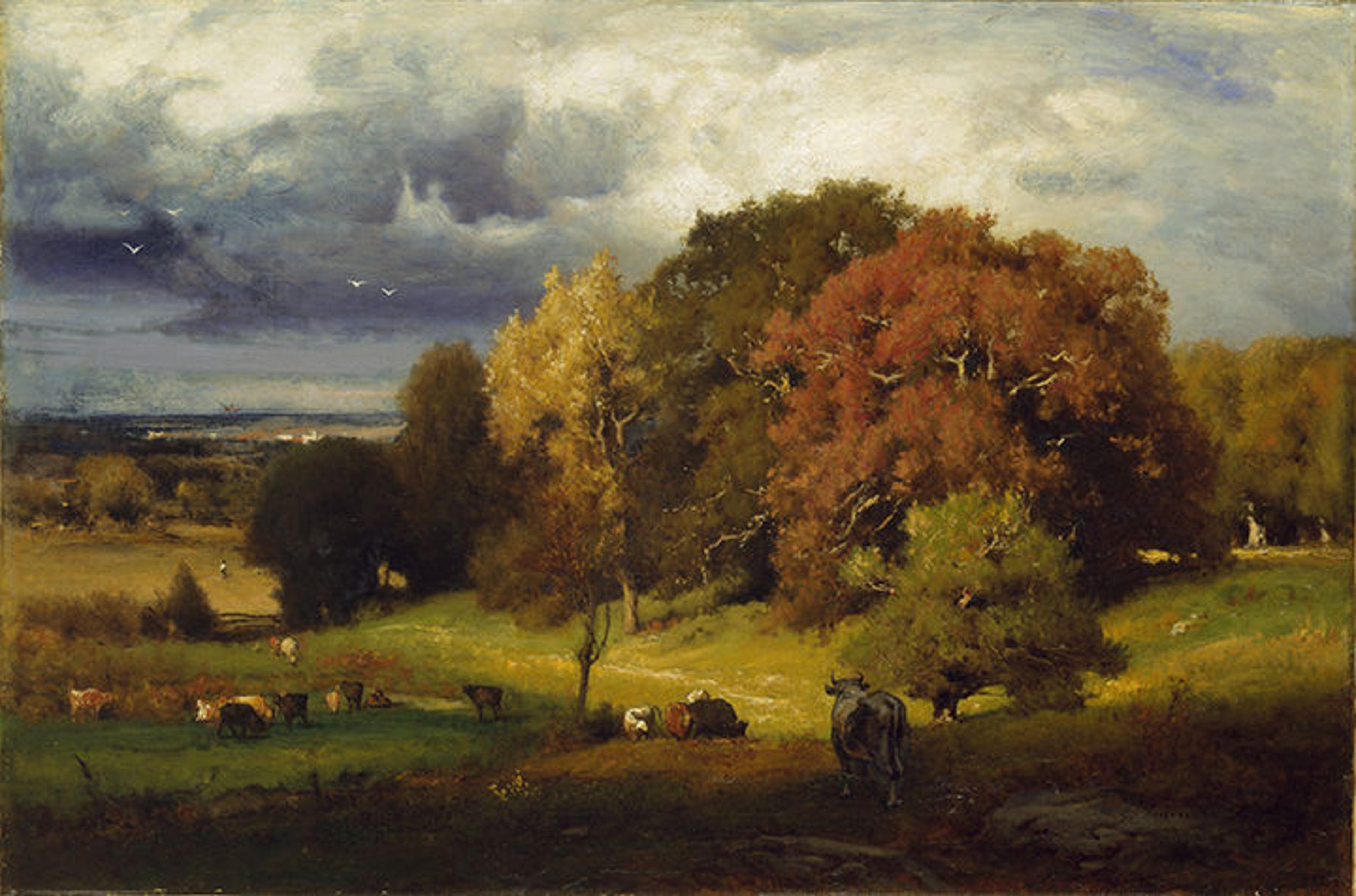 An autumn landscape by George Inness