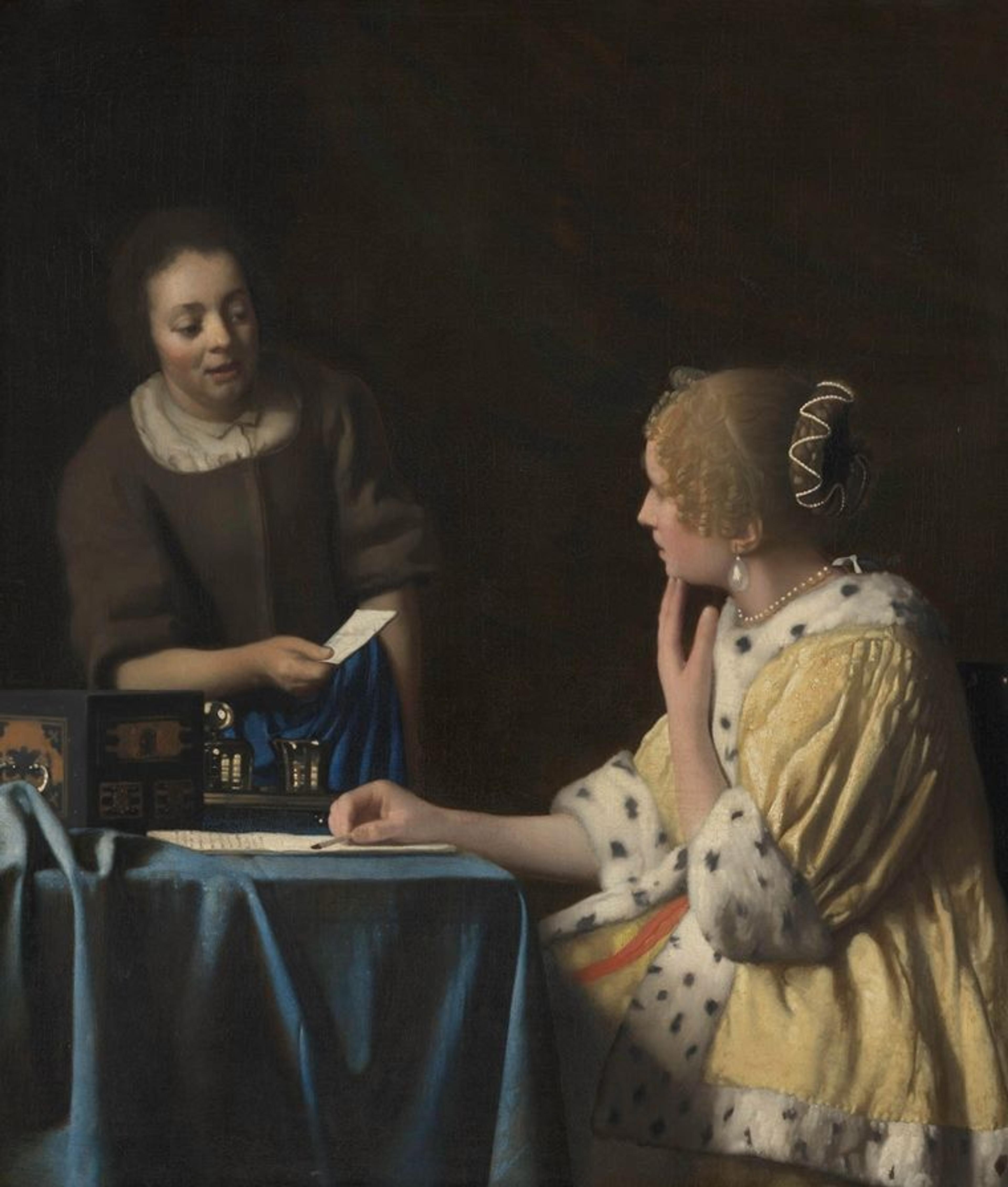 Plainly dressed maid handing a letter to an elegantly dressed mistress who is seated at a table.