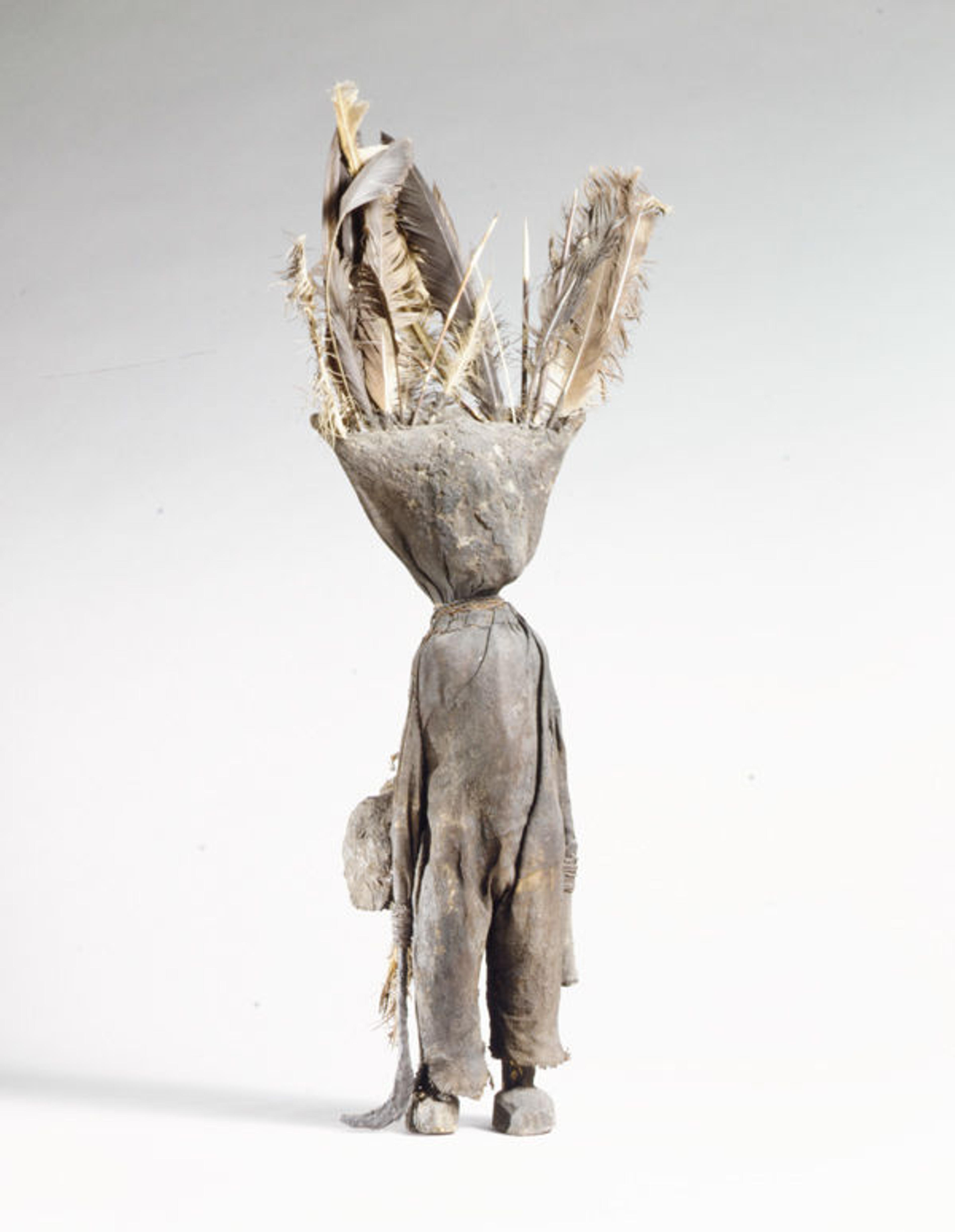 Oracle Figure (Kafigeledjo), 19th–mid-20th century. Côte d'Ivoire. Wood, iron, bone, porcupine quills, feathers, commercially woven fiber, organic material; H. 32 7/16 (82.5 cm) x W. 13 (33 cm) x D. 4 1/2 in (11.4 cm). The Metropolitan Museum of Art, New York, The Michael C. Rockefeller Memorial Collection, Gift of Mr. and Mrs. Raymond Wielgus, 1964 (1978.412.488)