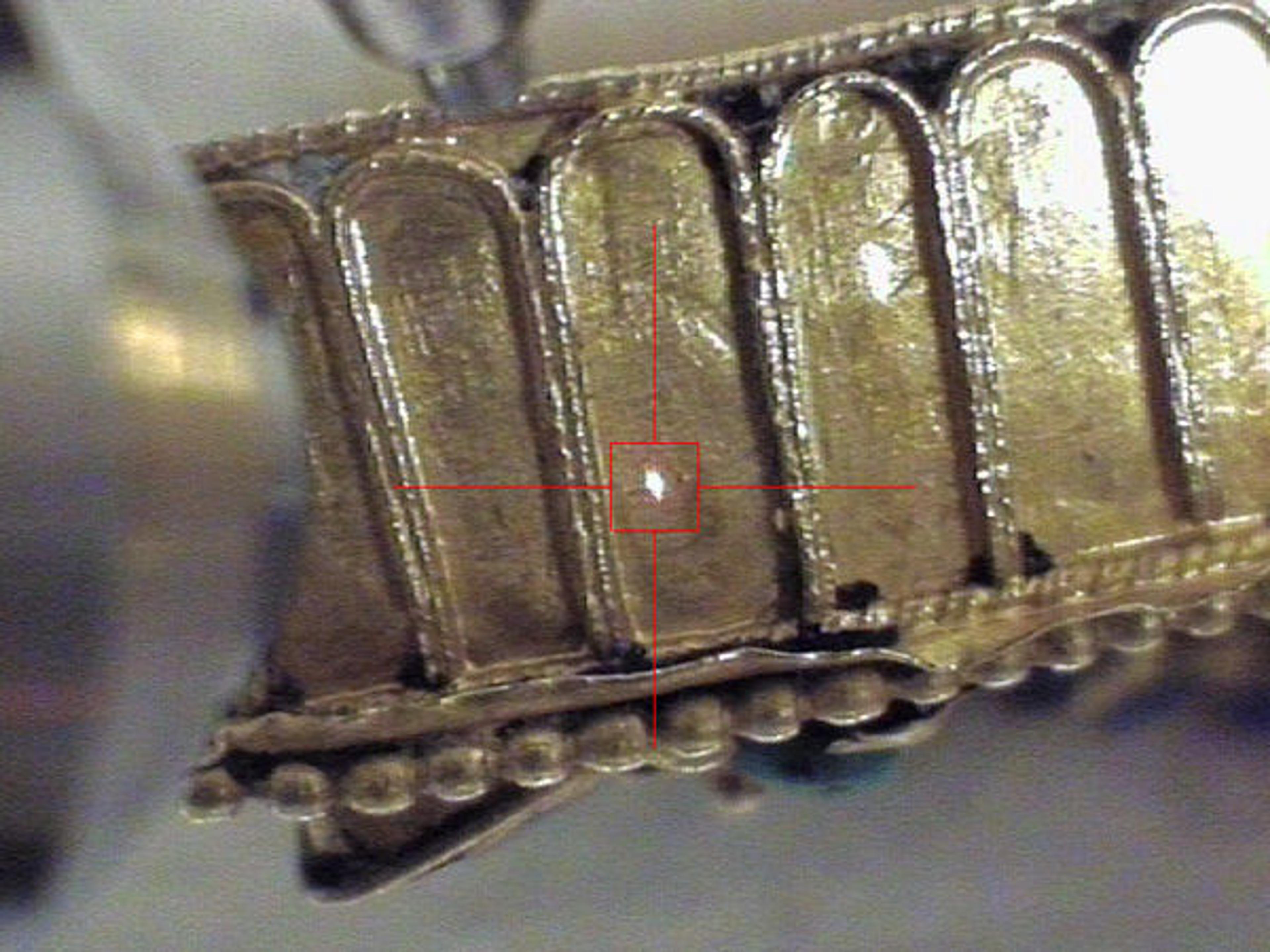 Detail view of 15.95.173a, b showing location of XRF analysis on the side of the box lid