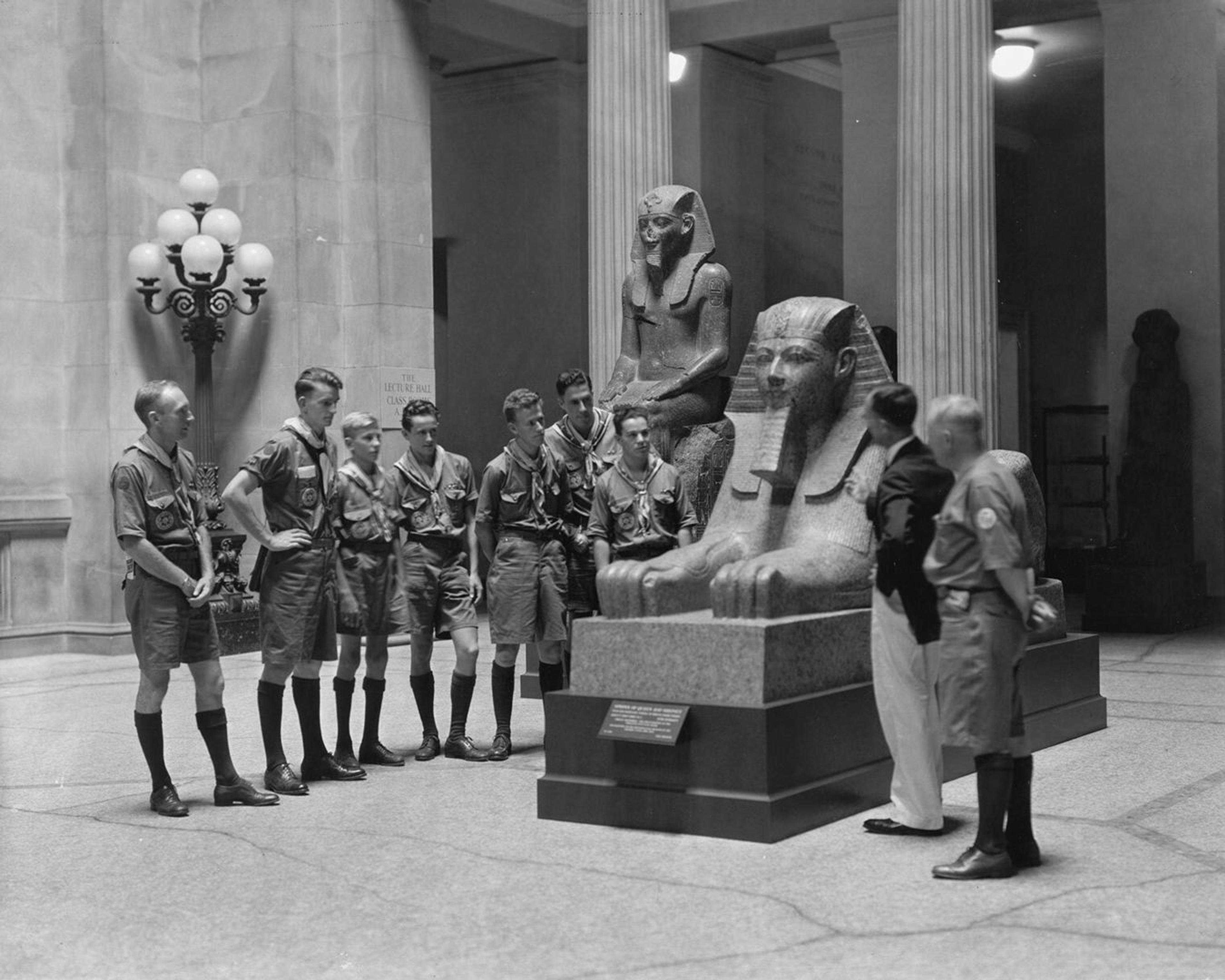 A black and white photo of a group of boy scouts