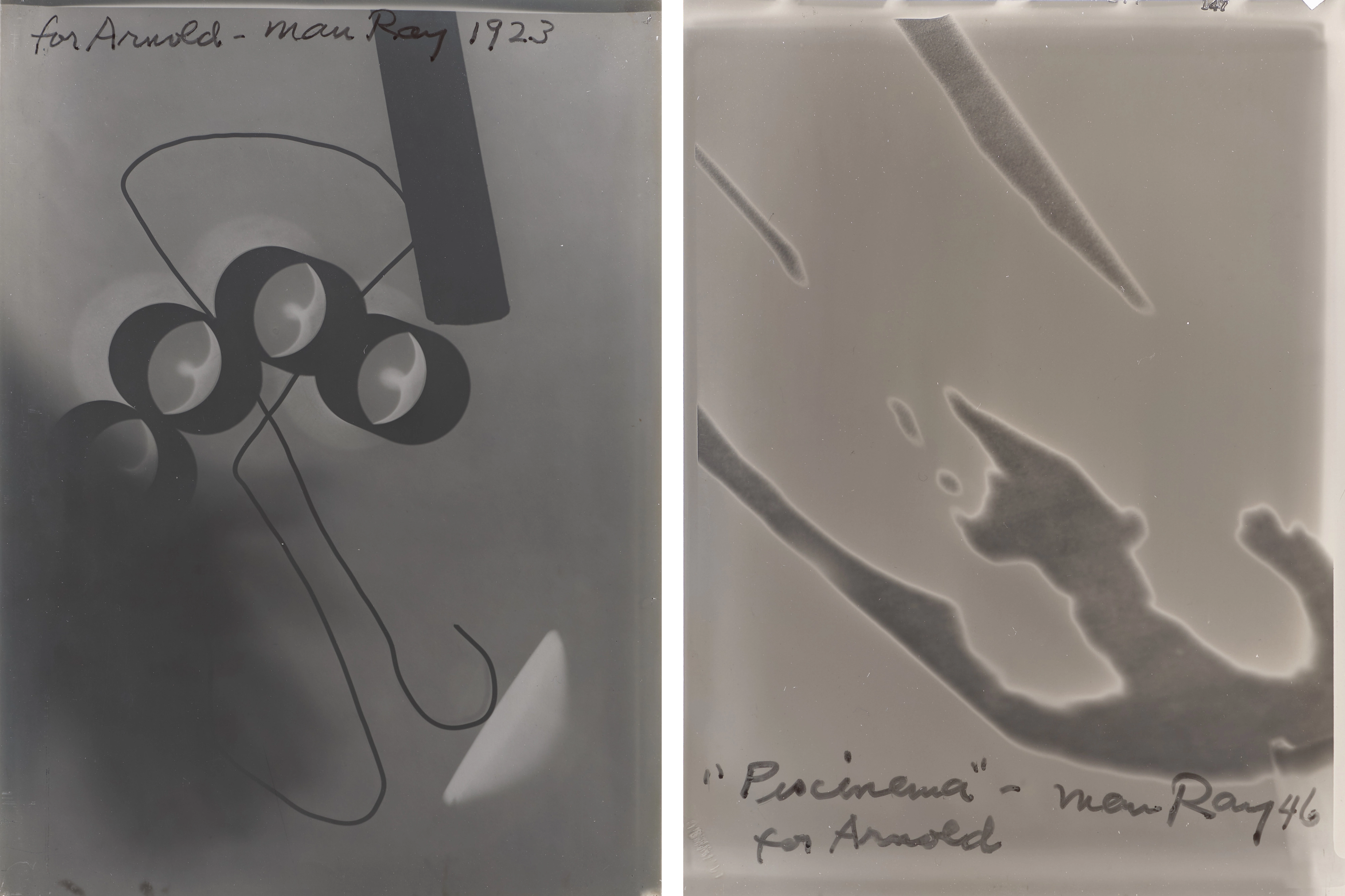 Diptych of two abstract black-and-white photograms with handwritten text. The image on the left reads "for Arnold - Man Ray 1923." The image on the right reads “‘Piscinema’ – Man Ray 46 / for Arnold.”