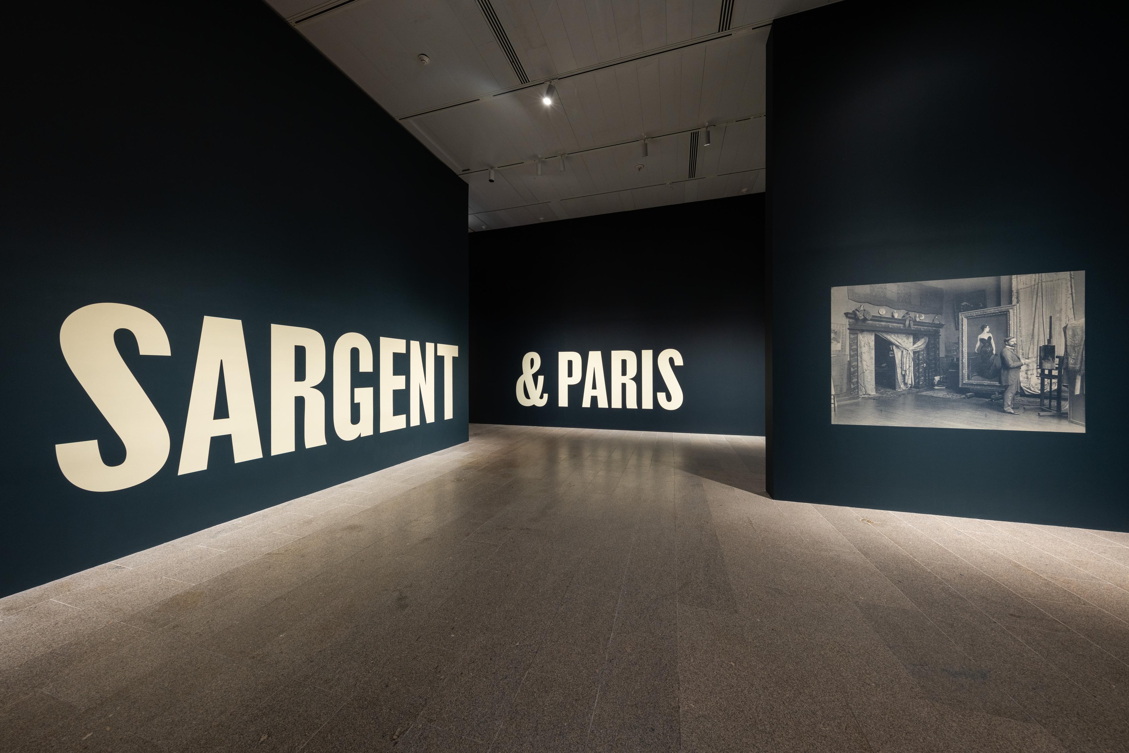 Opening gallery view with white large print letters