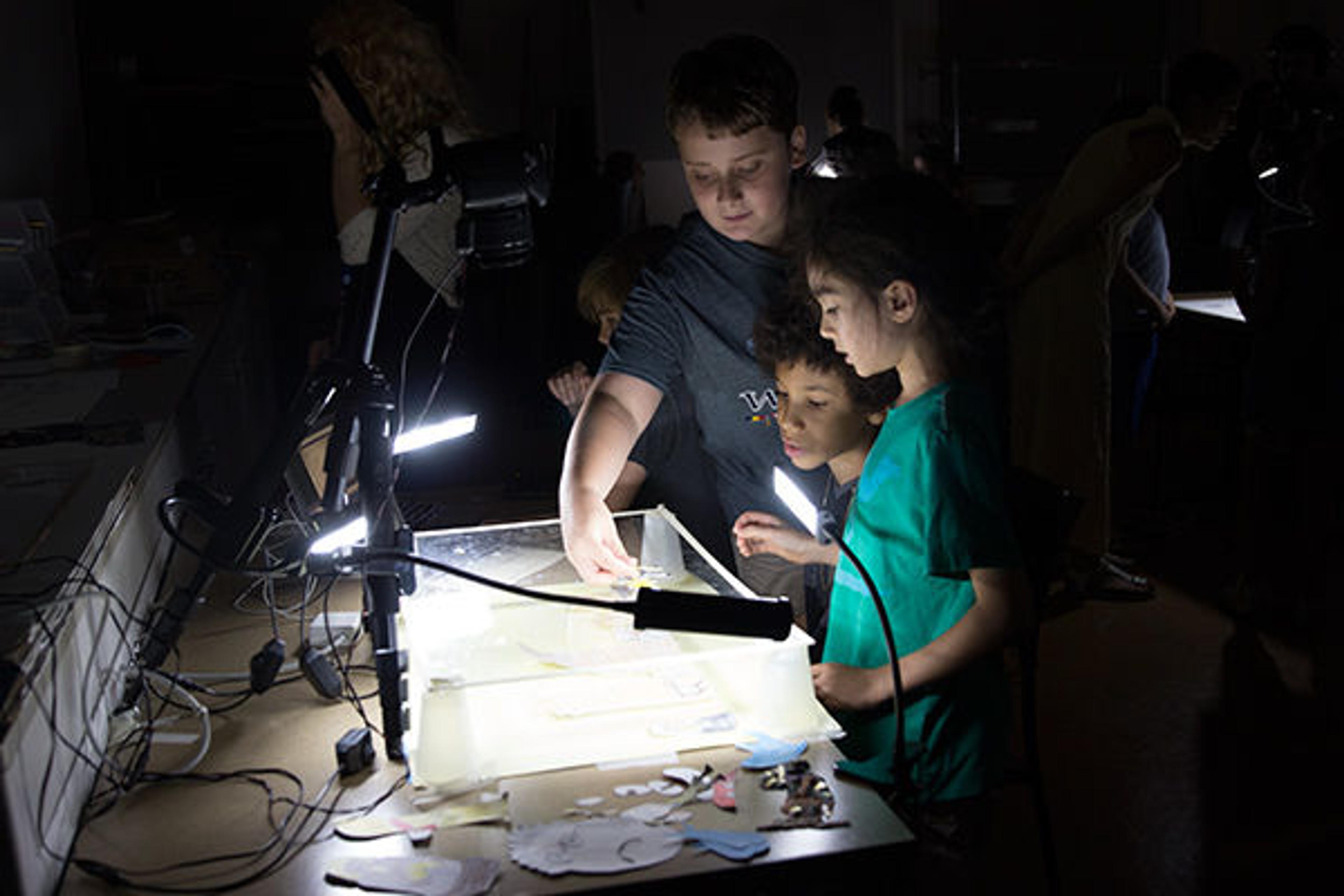 A group of children learning stop motion animation