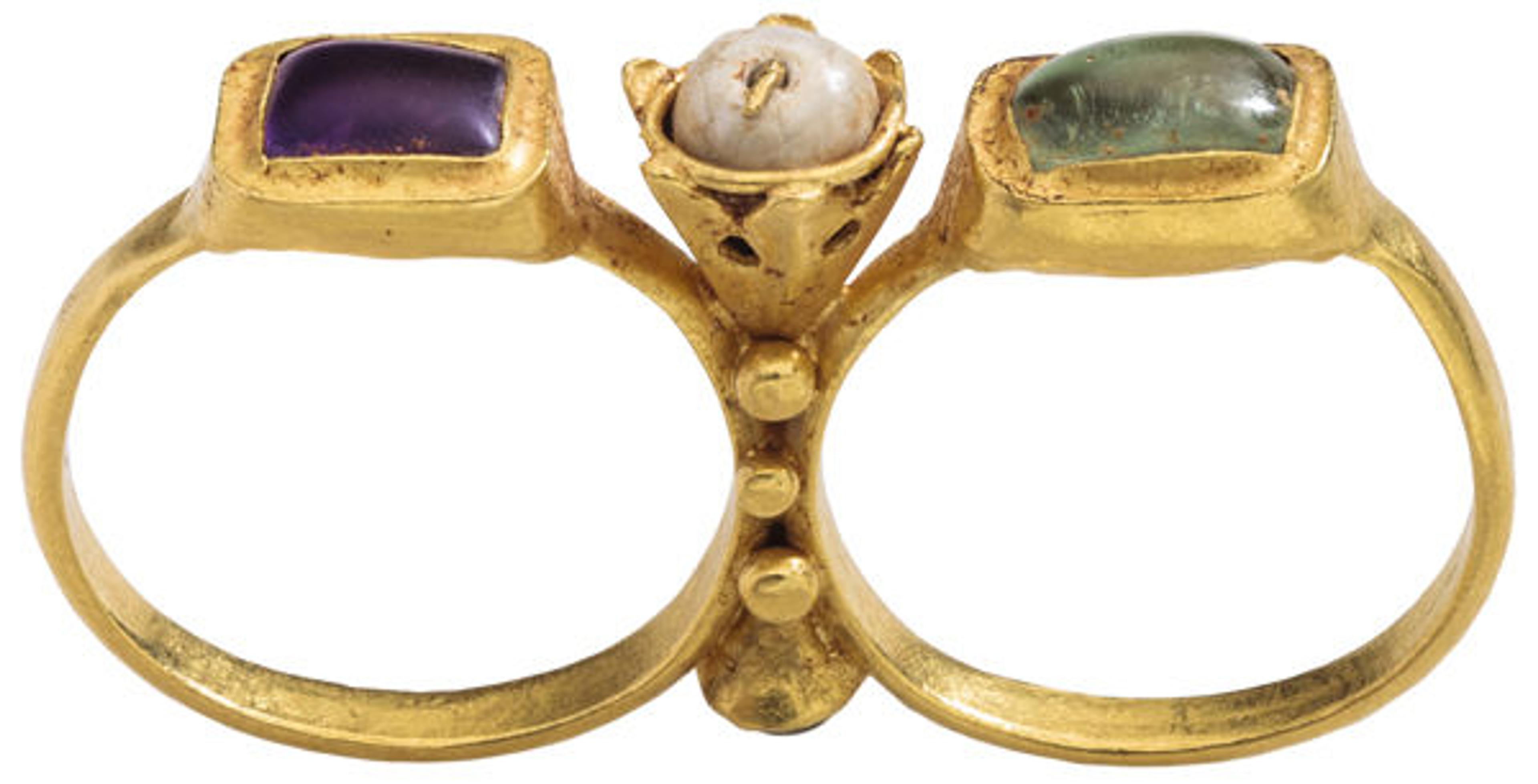 Two-Finger Ring, early 6th century. Byzantine. Gold, amethyst, emerald, glass, pearl; Height 27 mm.; length 45.7 mm.; weight 11.79 g.; US 10 and 10.25, UK. Griffin Collection