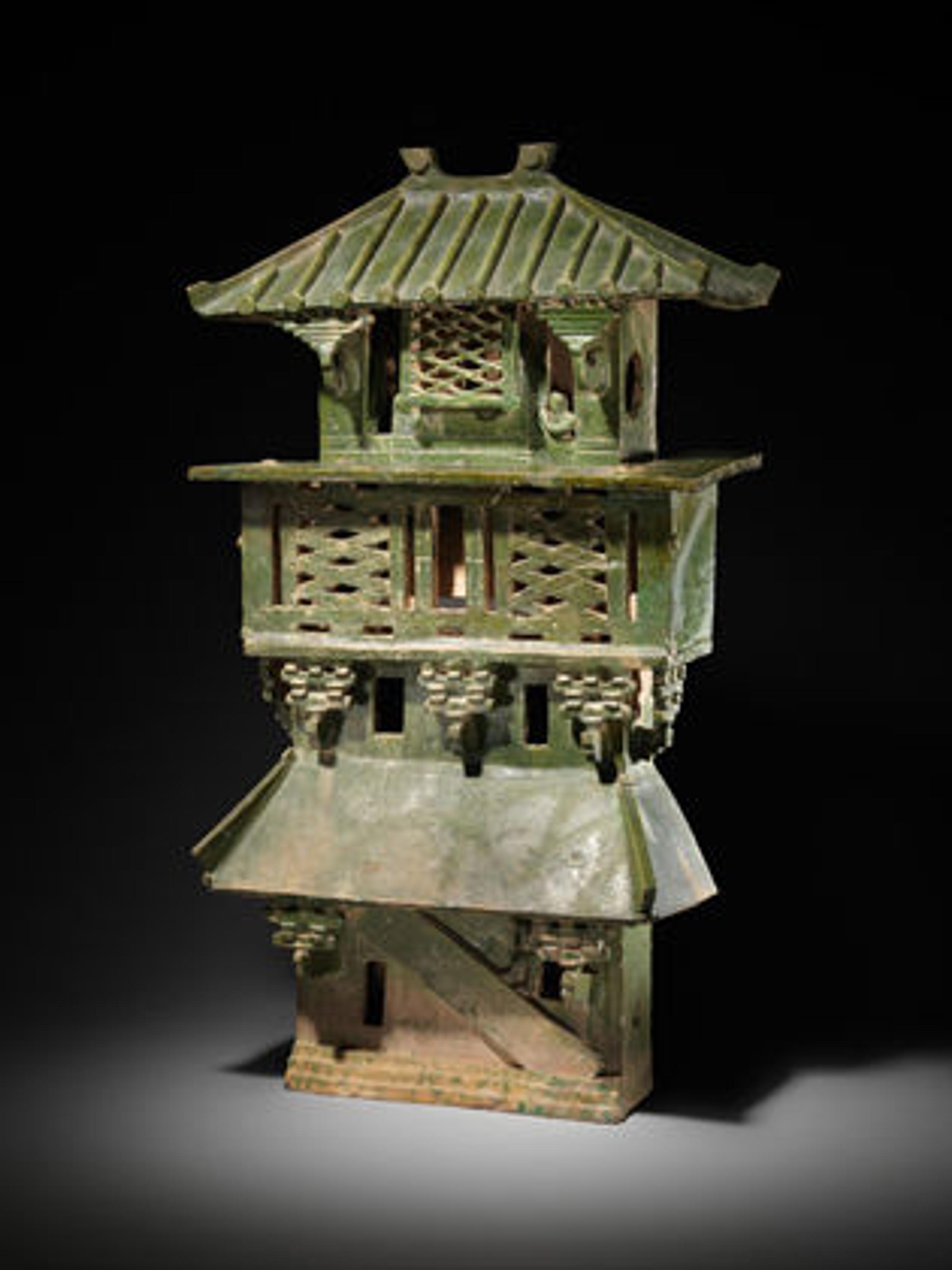 Central watchtower, 1st–early 3rd century. China, Eastern Han dynasty (25–220 A.D.). Earthenware with green lead glaze; H. 104.1 cm (41 in.), W. 57.5 cm (22 5/8 in.), D. 29.8 cm (11 3/4 in.). The Metropolitan Museum of Art, New York, Purchase, Dr. and Mrs. John C. Weber Gift, 1984 (1984.397a, b)