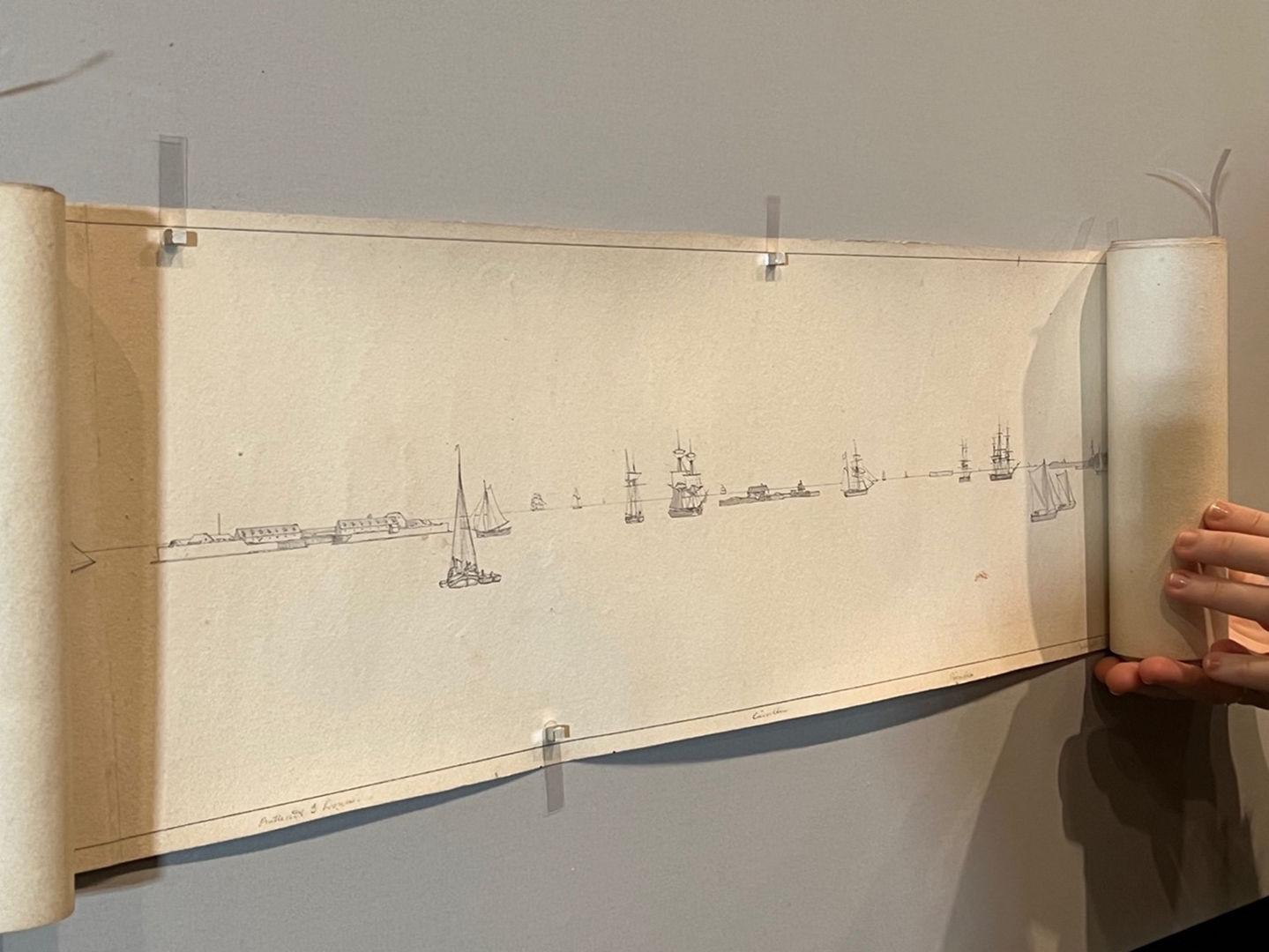 Installing the panorama by unrolling and placing magnets