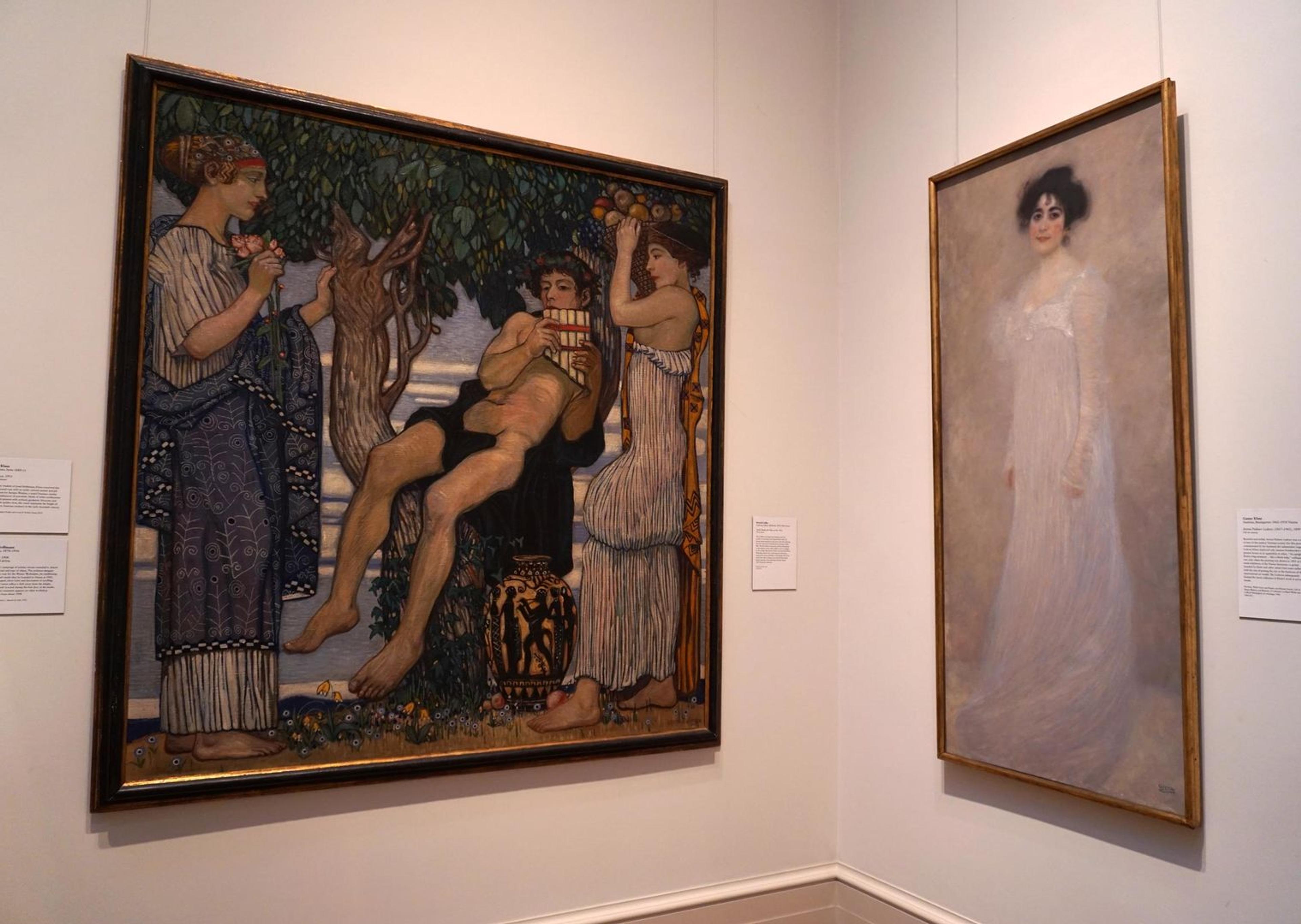 View of Bertold Löffler's "Youth Playing the Pipes of Pan" installed next to a Klimt portrait of a woman