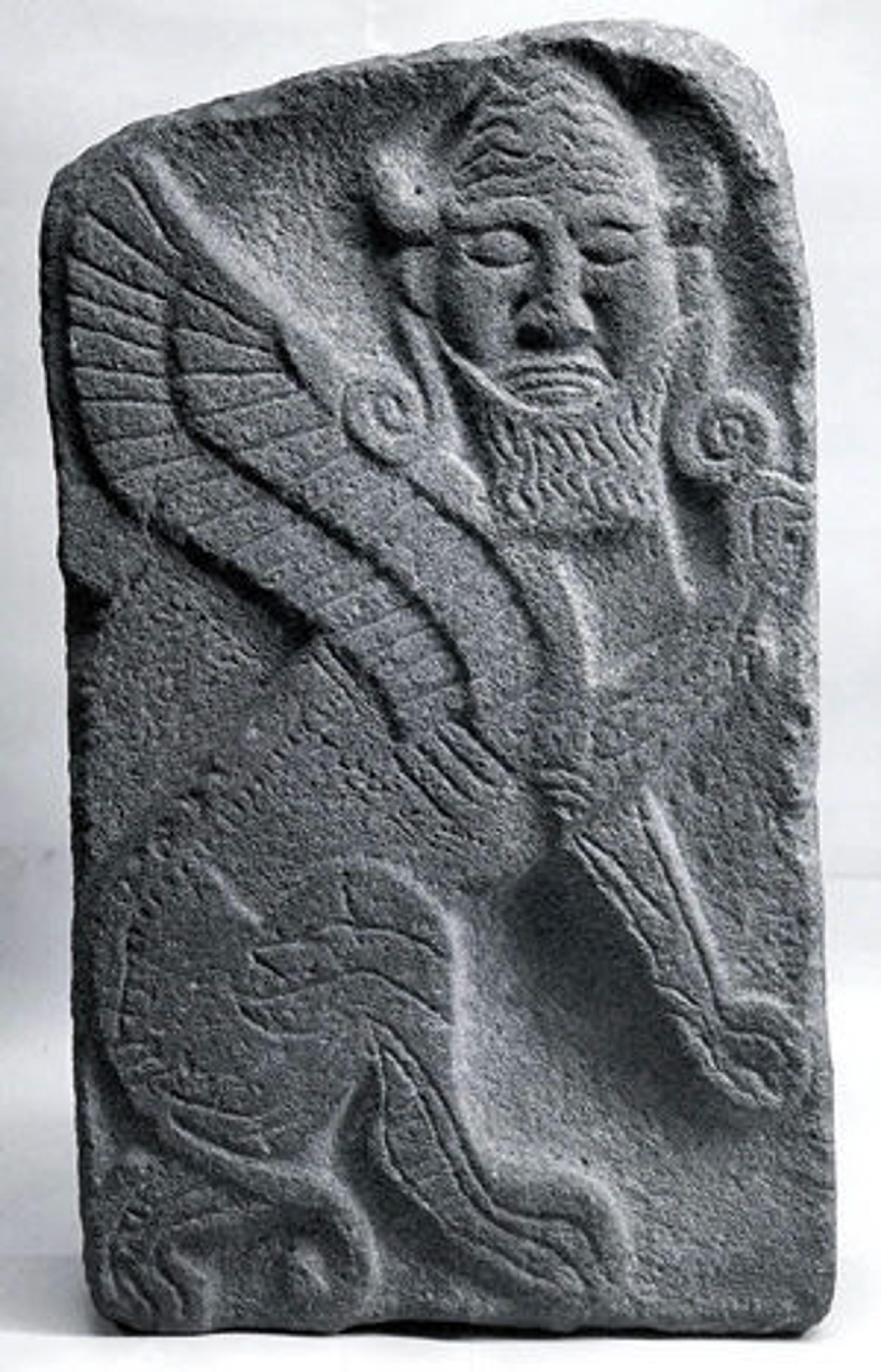 Orthostat relief: winged human-headed bull (43.135.4)