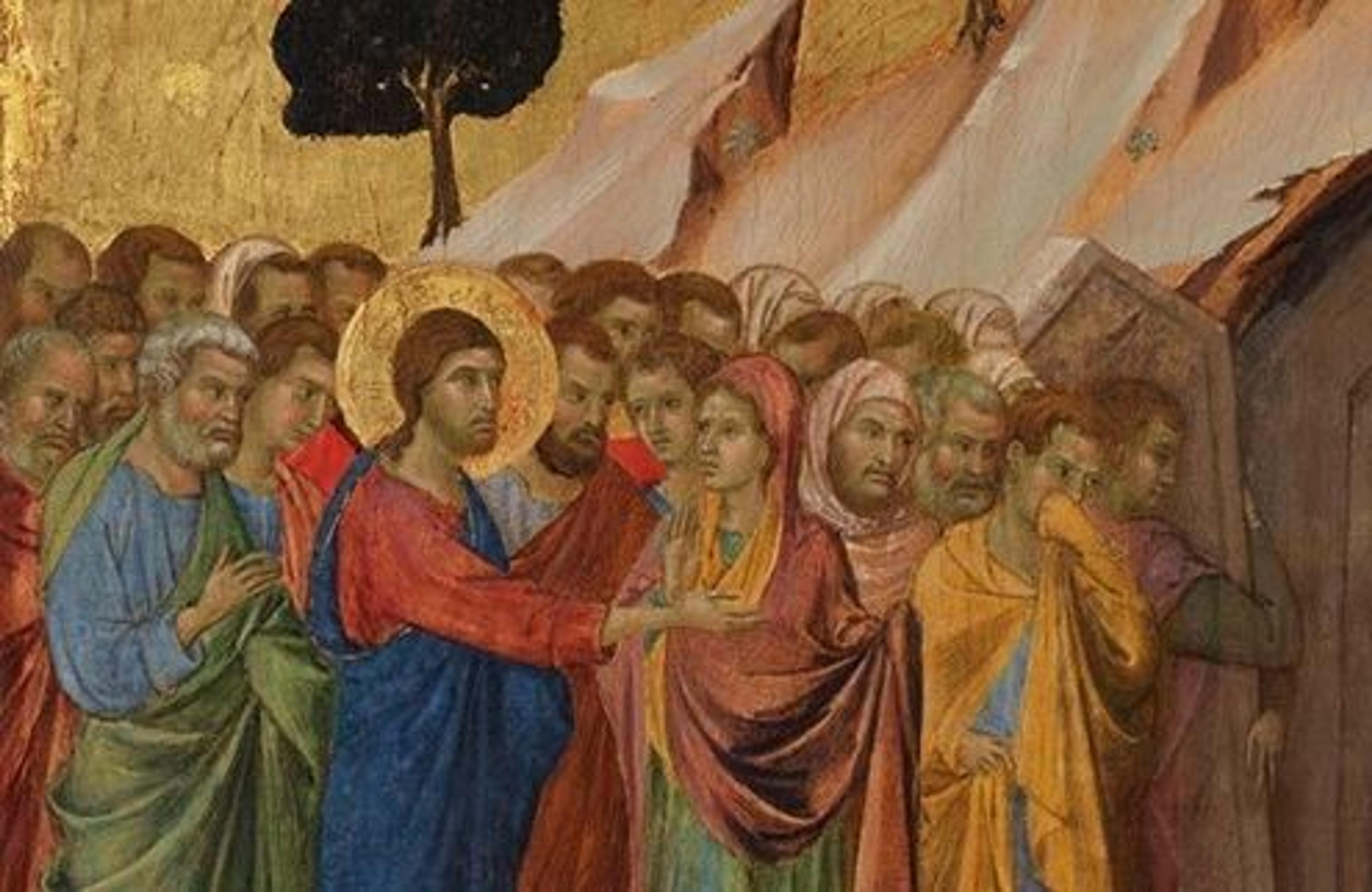 A cluster of robed figures in a narrative scene. One figure with a halo around his head points to an open door in the side of a mountain.