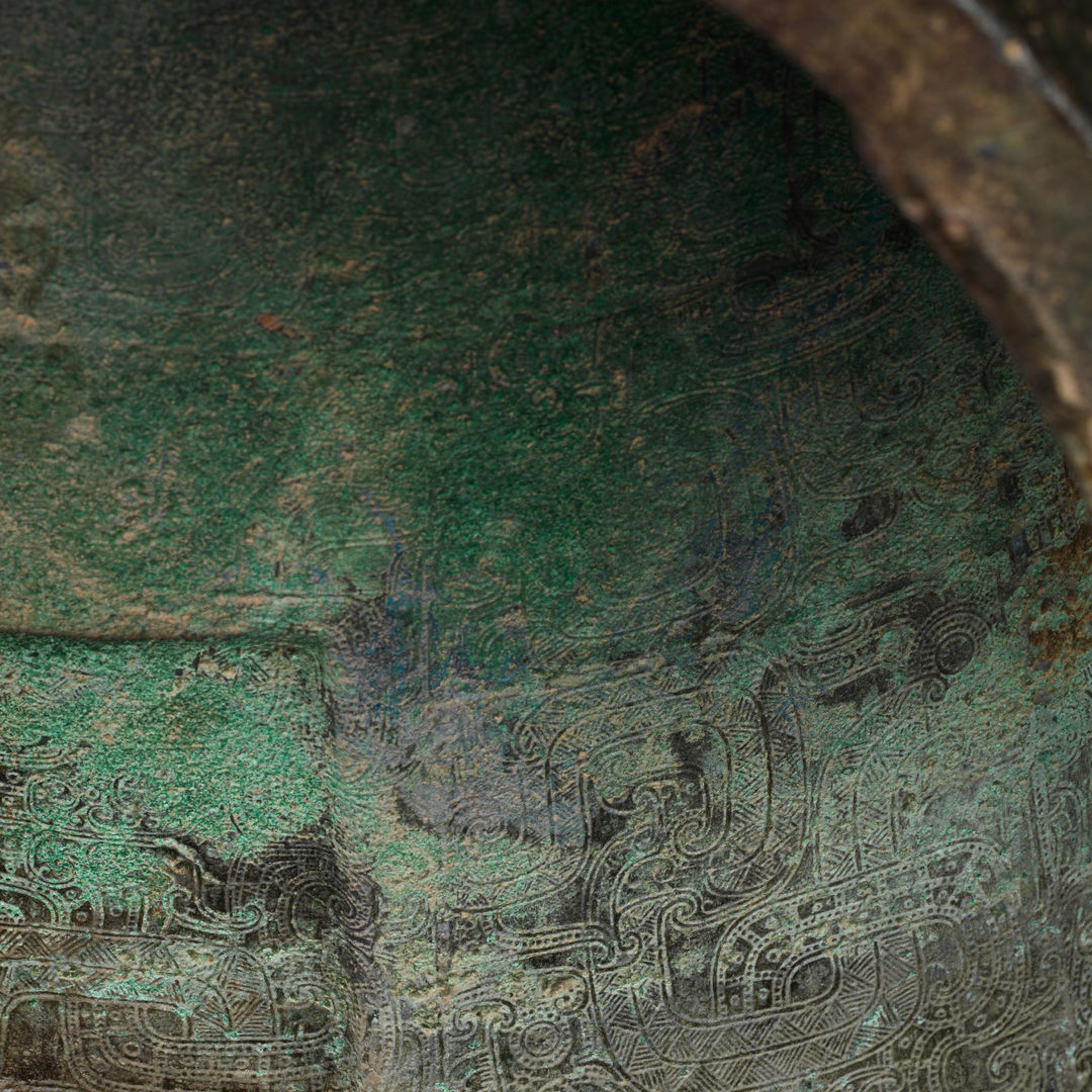 Detail of the interior of a 5th-century BC bronze Chinese zhong or bell with a green patina