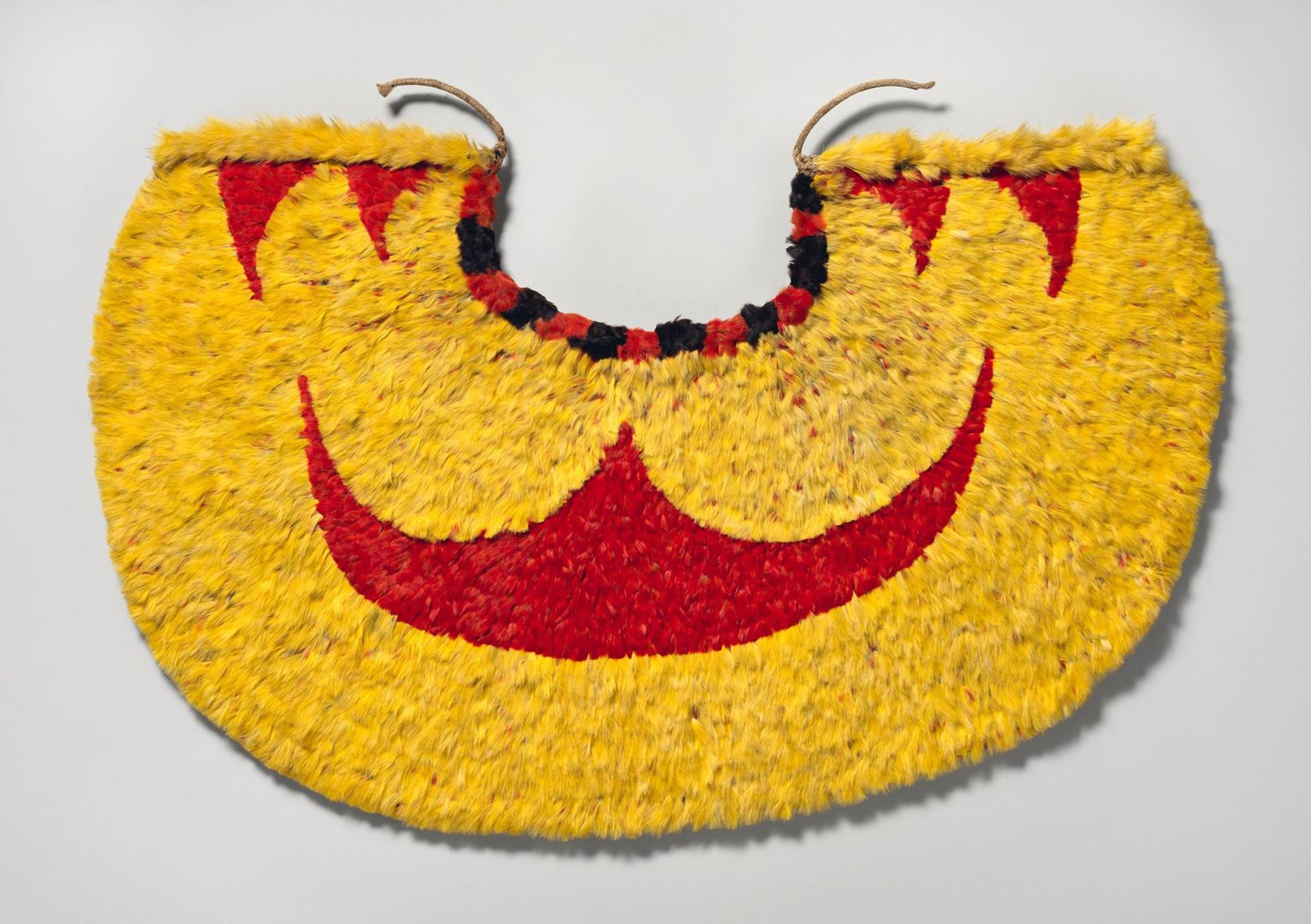 A gorgeous Hawai'ian cape made of red and yellow feathers