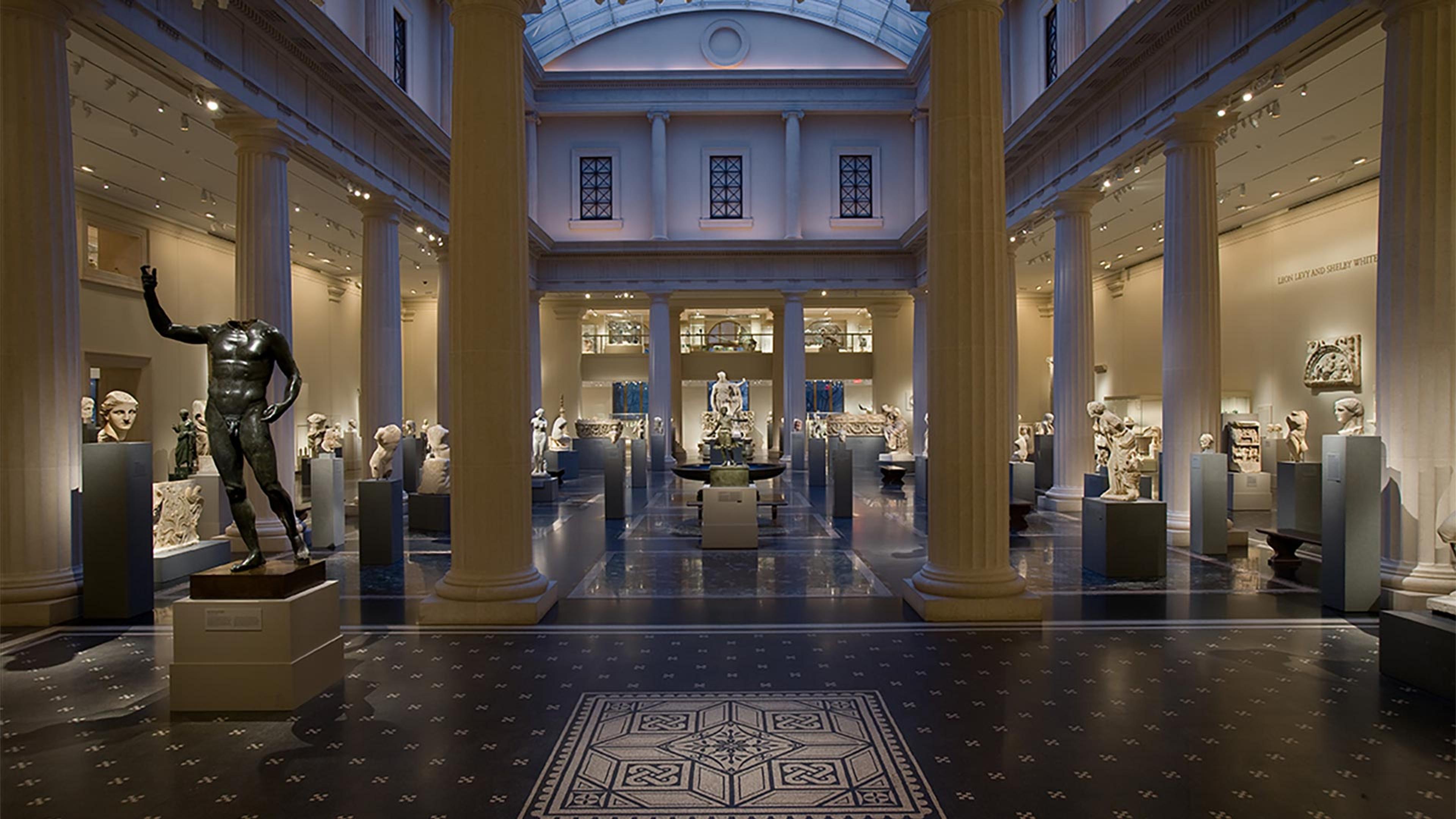 A large court filled with ancient Greek and Roman statues