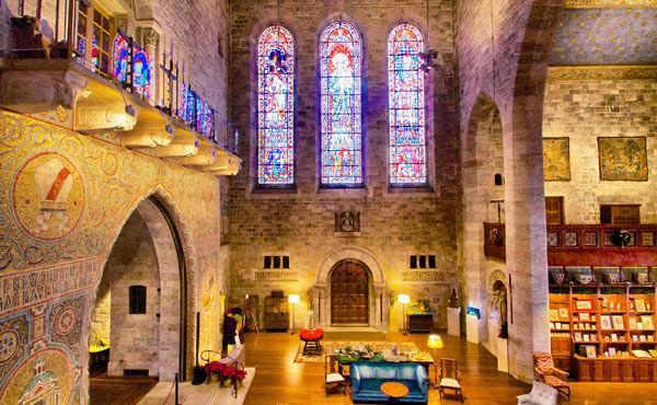 Glencairn's Great Hall is decorated with mosaics, stained glass, and architectural sculpture. Many medieval fragments of architectural sculpture are incorporated into the walls. Photograph courtesy of Glencairn Museum
