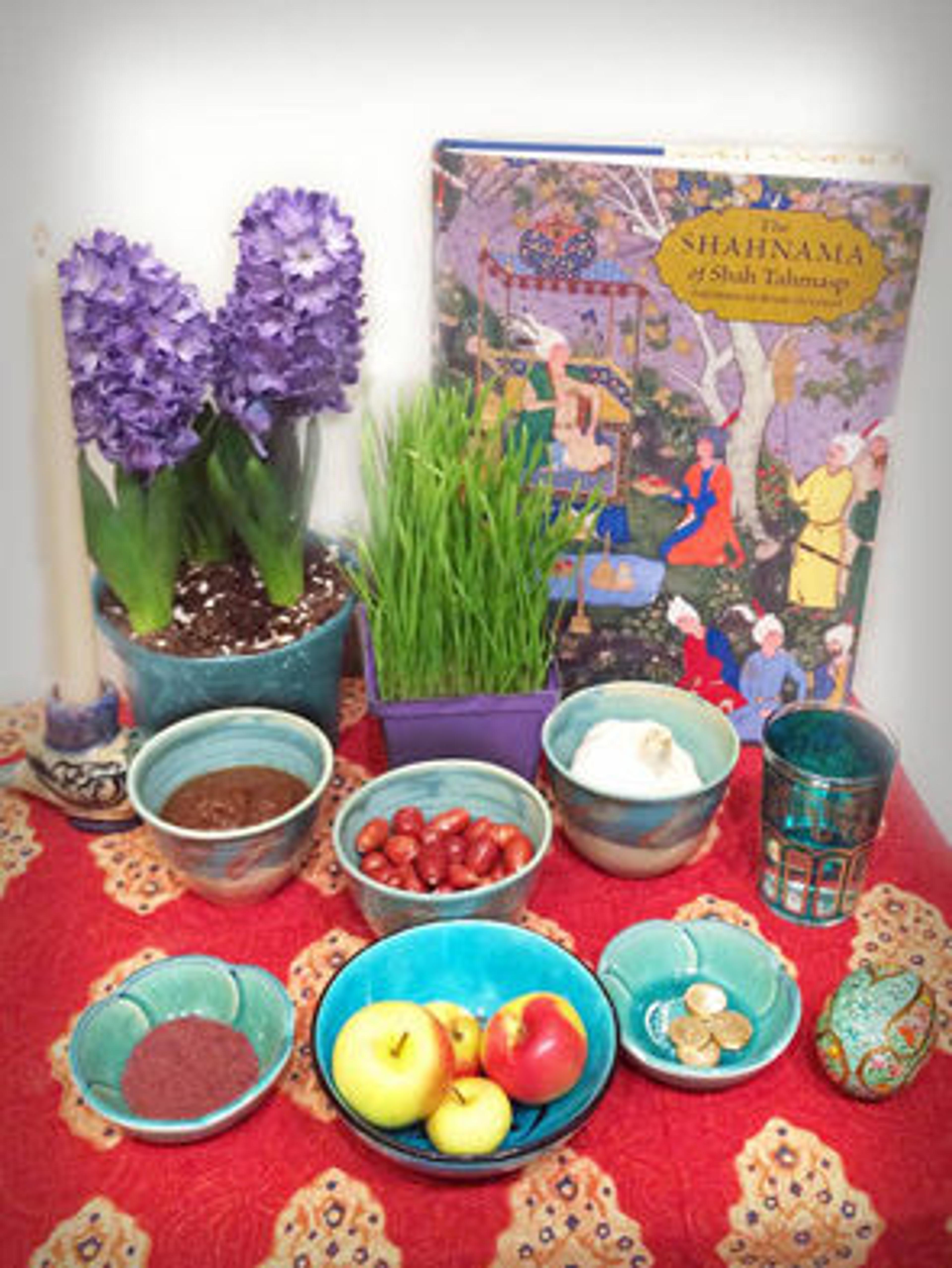 The Shahnama of Shah Tahmasp makes a perfect Nauruz gift and a beautiful addition to the Haft Seen table, as demonstrated by this spread in the Museum's Editorial Department.