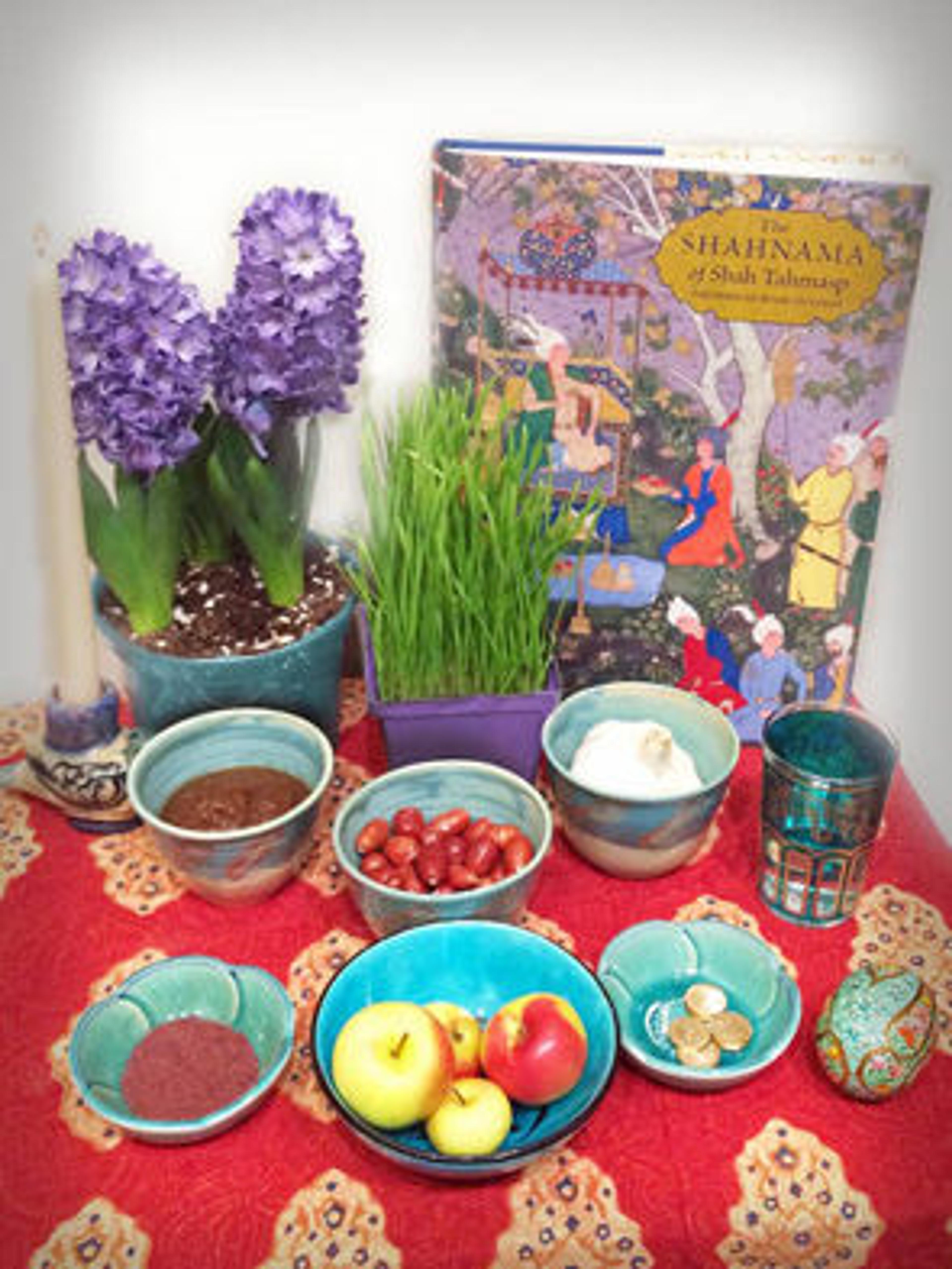 The Shahnama of Shah Tahmasp makes a perfect Nauruz gift and a beautiful addition to the Haft Seen table, as demonstrated by this spread in the Museum's Editorial Department. 