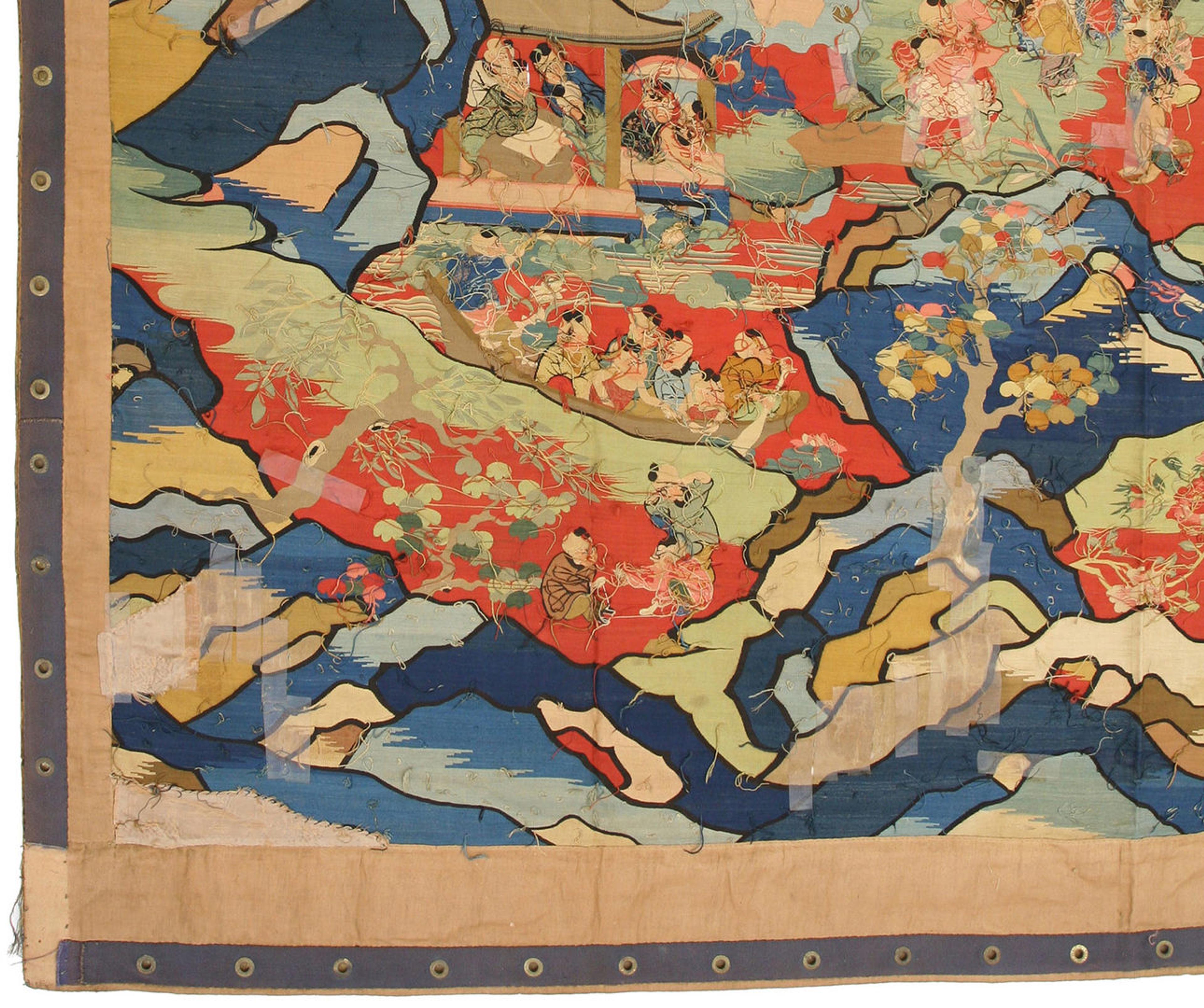 Lower right side of the tapestry, reverse side, showing tape with grommets
