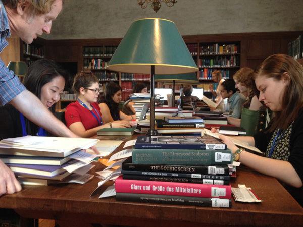 Cloisters interns in The Cloisters Library
