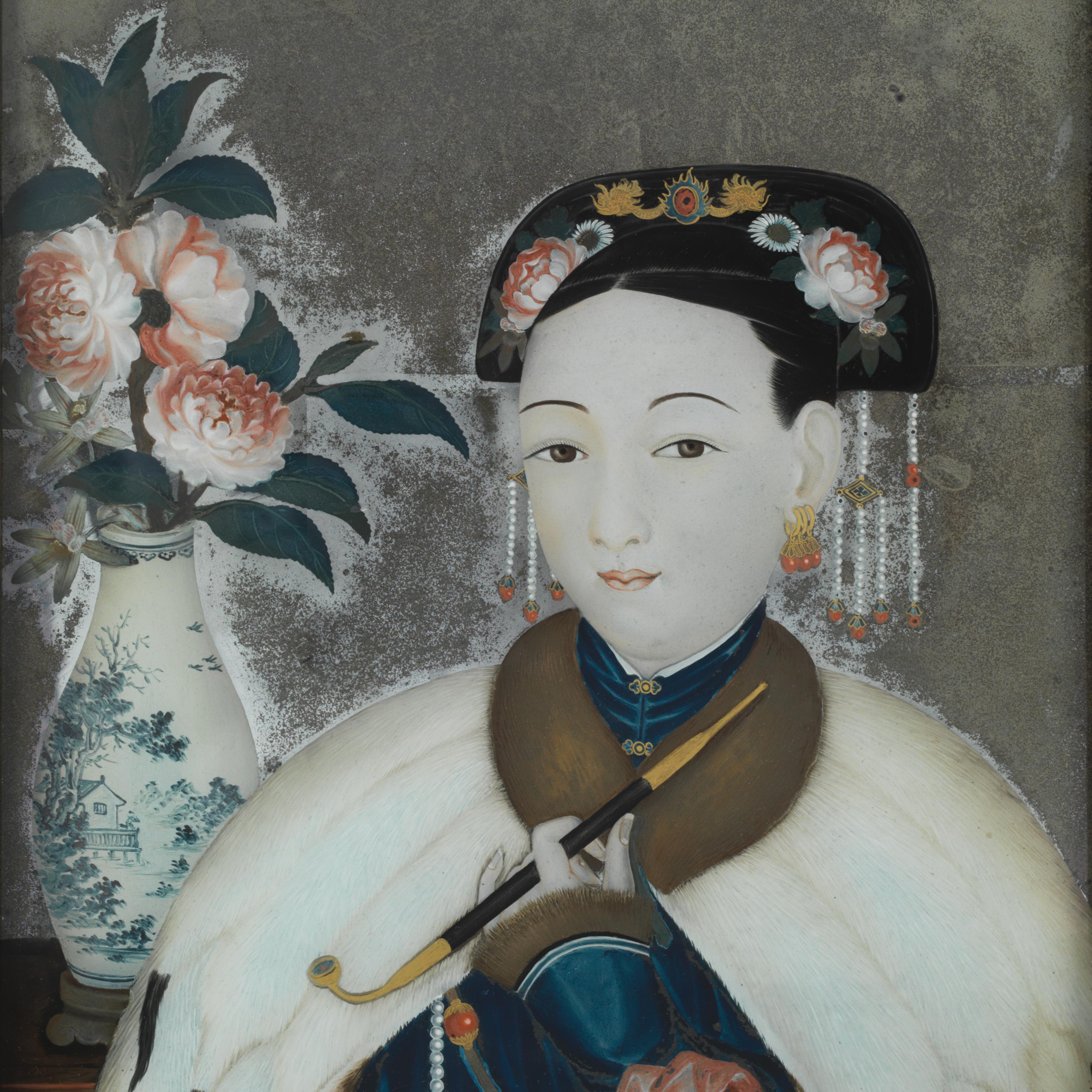 Traditional Asian painting of a woman smoking a pipe.