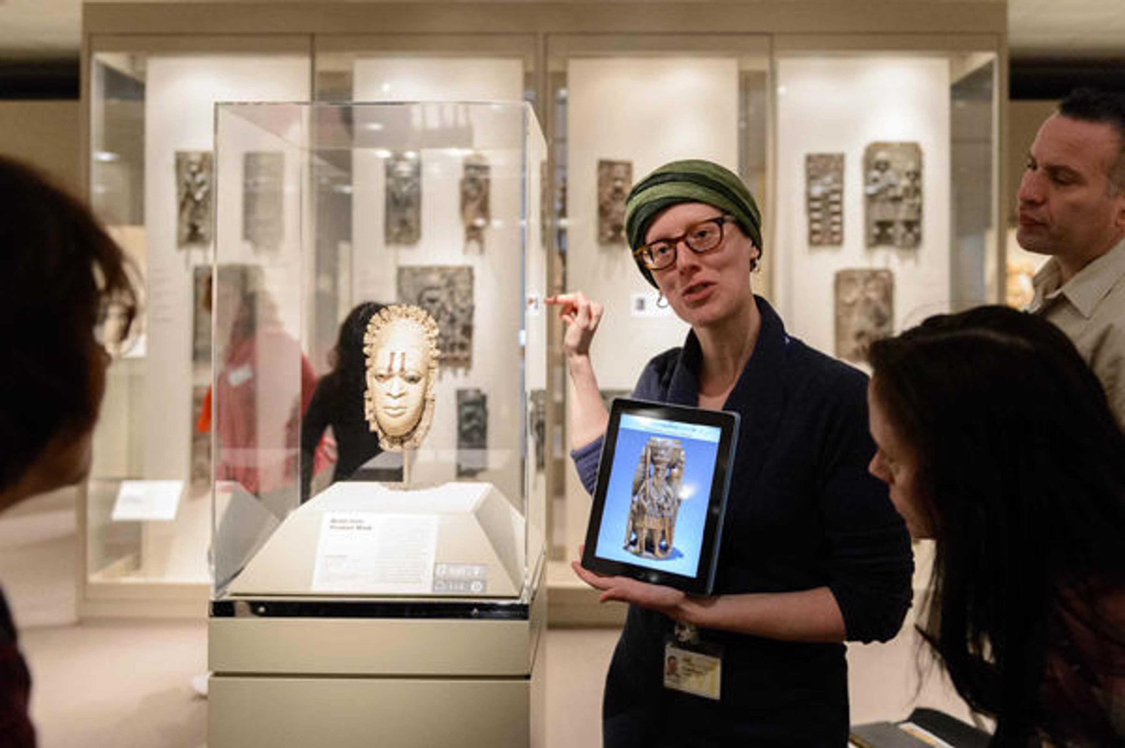 Betsy Gibbons, assistant museum educator for High School Internships, leads a guided tour. Photograph by Filip Wolak