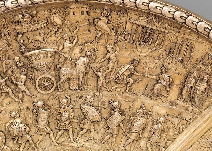 Tiberius kneeling before Augustus