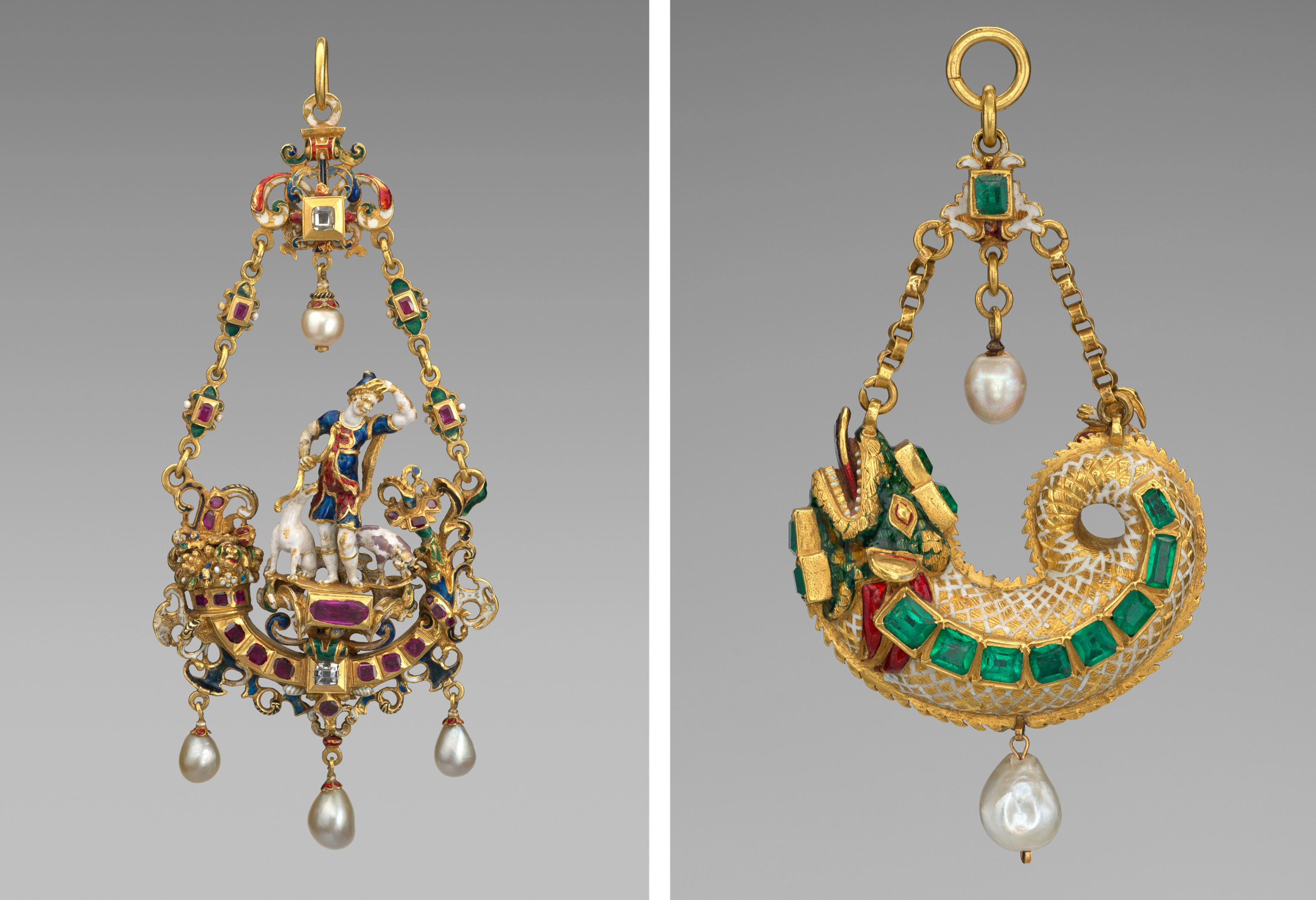 Two gold and bejeweled pendants showing a person with two dogs, and a fish, respectively