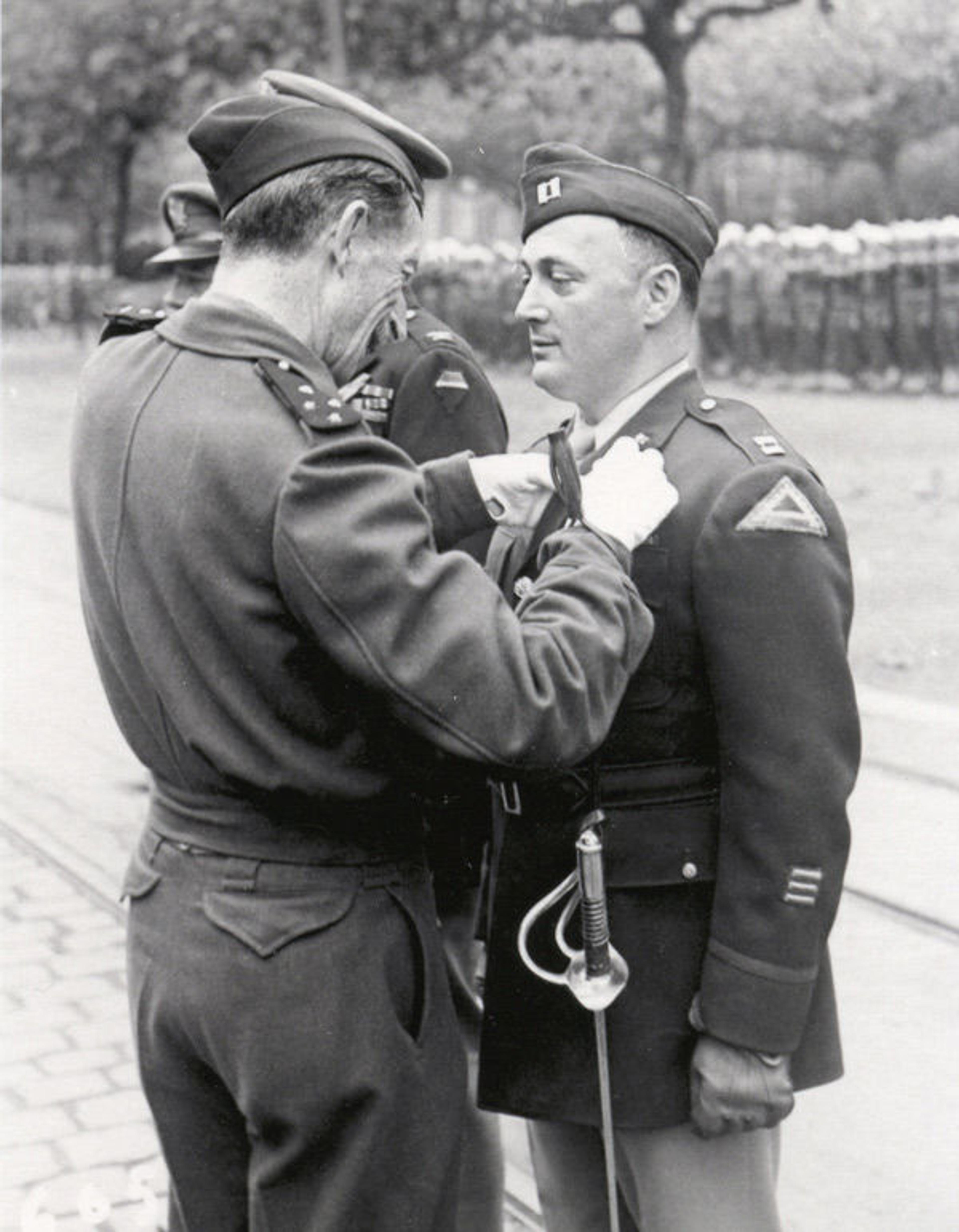 James J. Rorimer receives military decoration, 1945