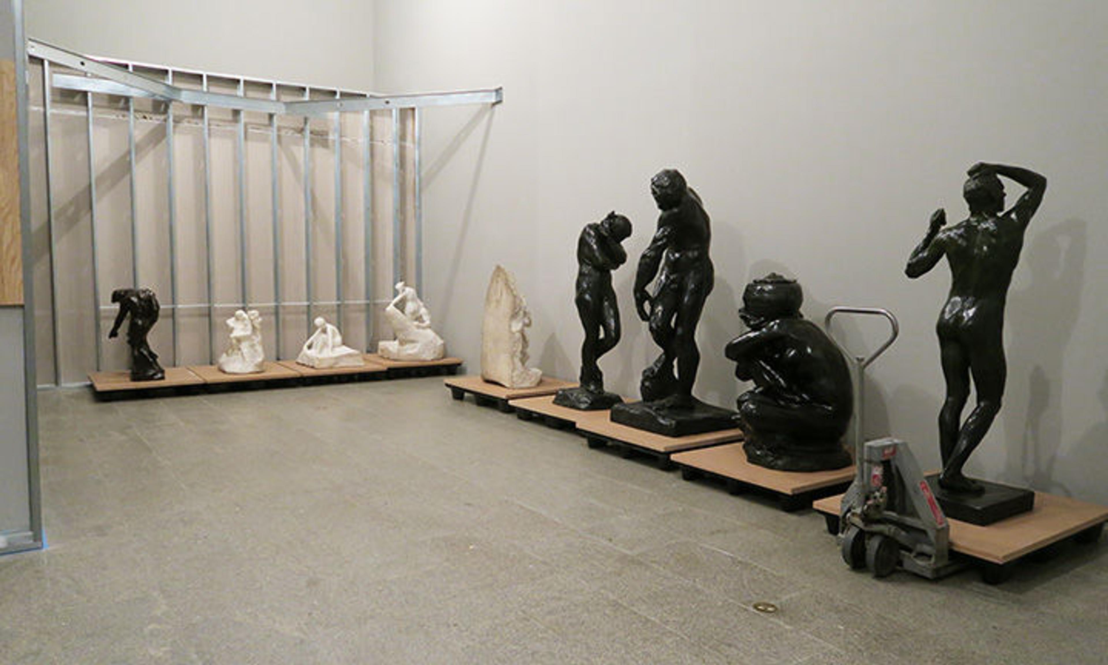 Rodin marbles and bronzes lined up in temporary storage