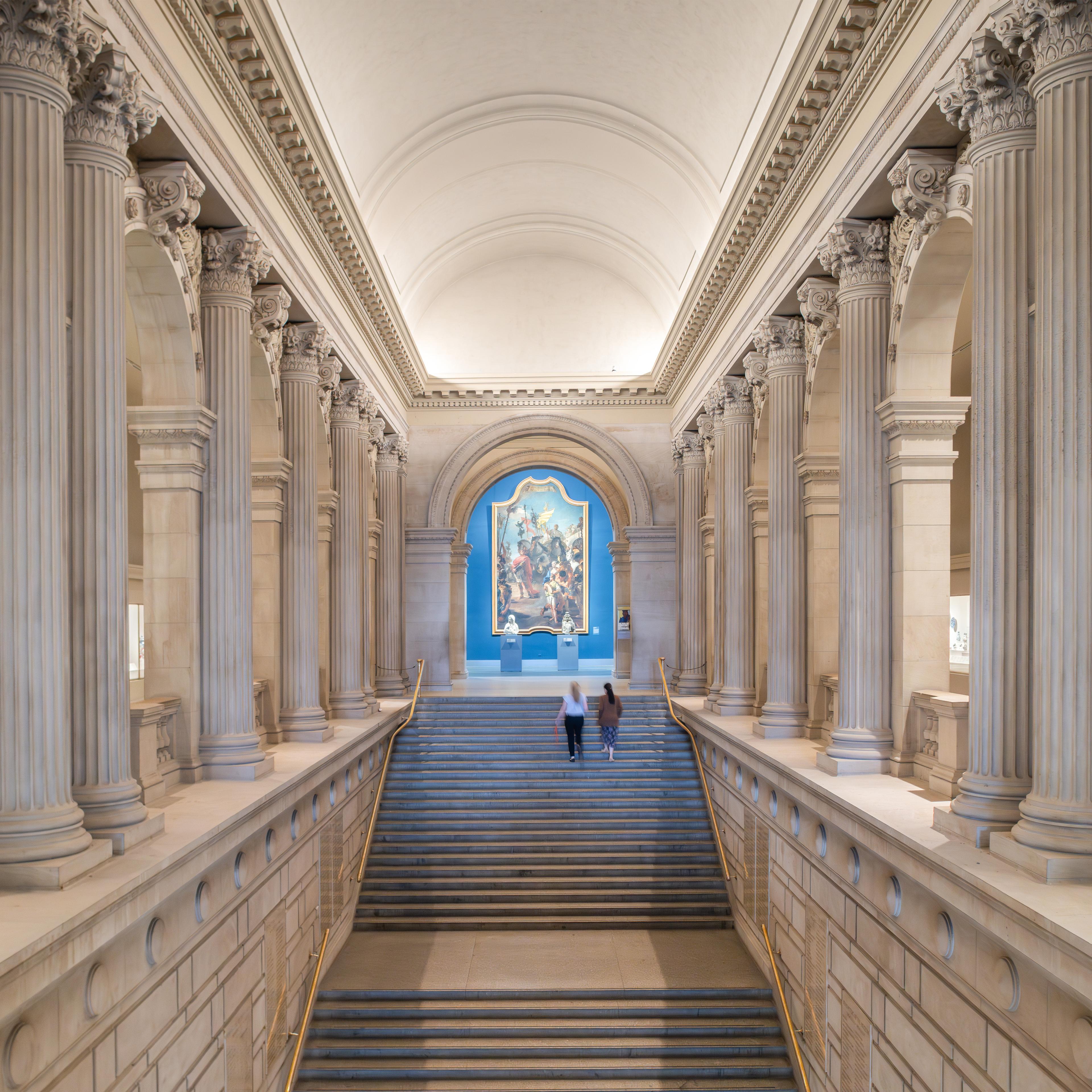 Visitors make their way up the Great Hall stairs